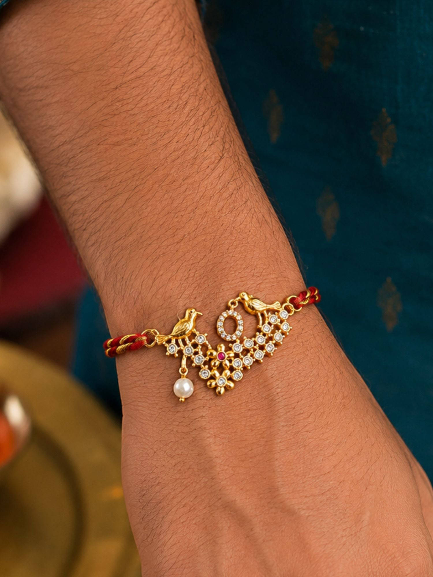 Digital Dress Room O Letter Bird Pearl and Stone Design Rakhi