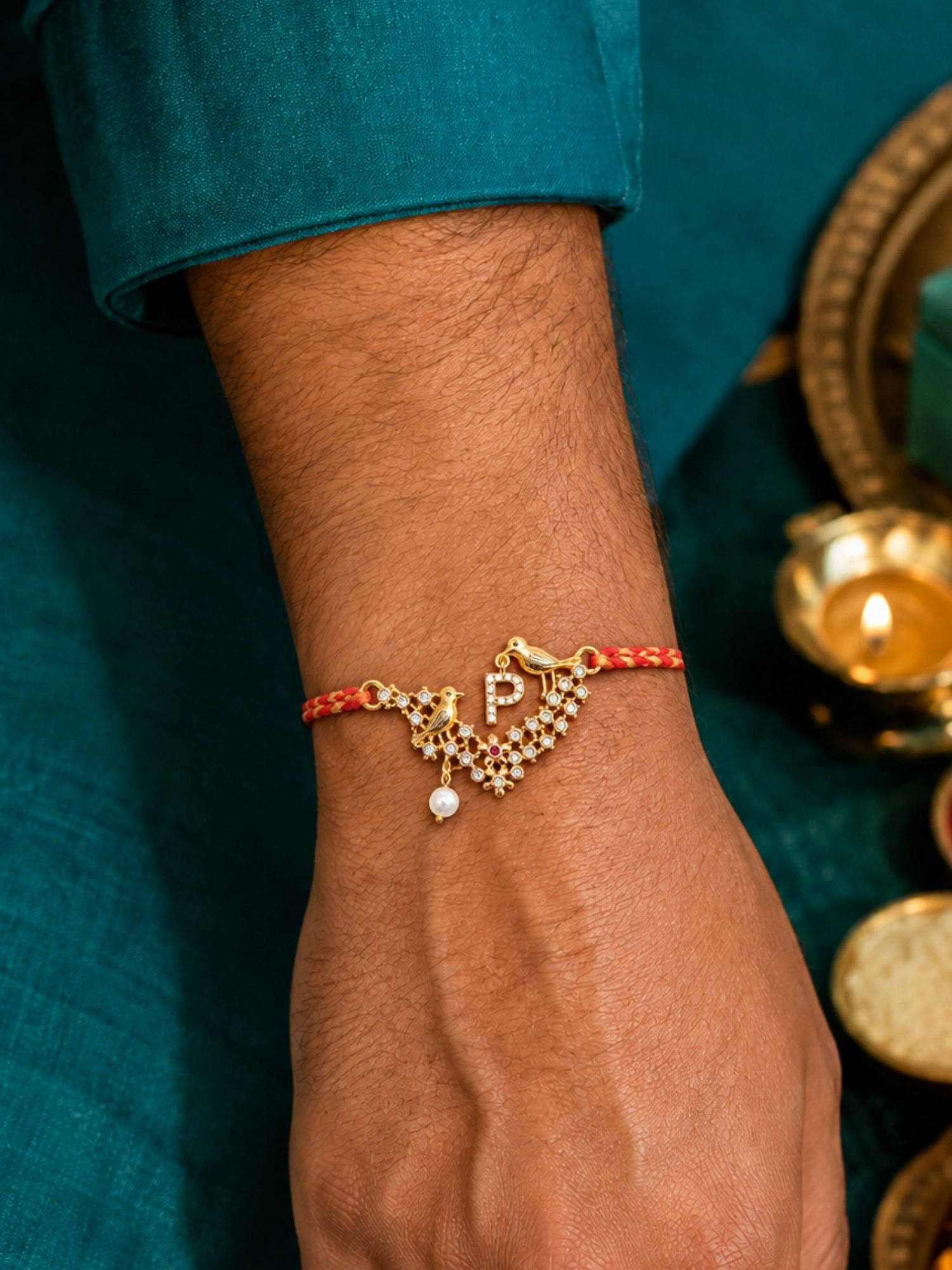 Digital Dress Room P Letter Bird Pearl and Stone Design Rakhi