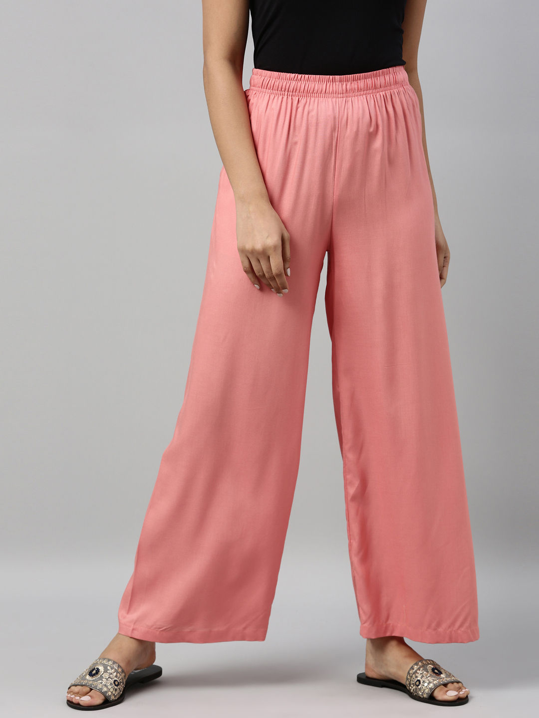 Go Colors Women Peach Solid Viscose Knit Mid Rise Palazzos  Peach Buy Go  Colors Women Peach Solid Viscose Knit Mid Rise Palazzos  Peach Online at  Best Price in India  Nykaa