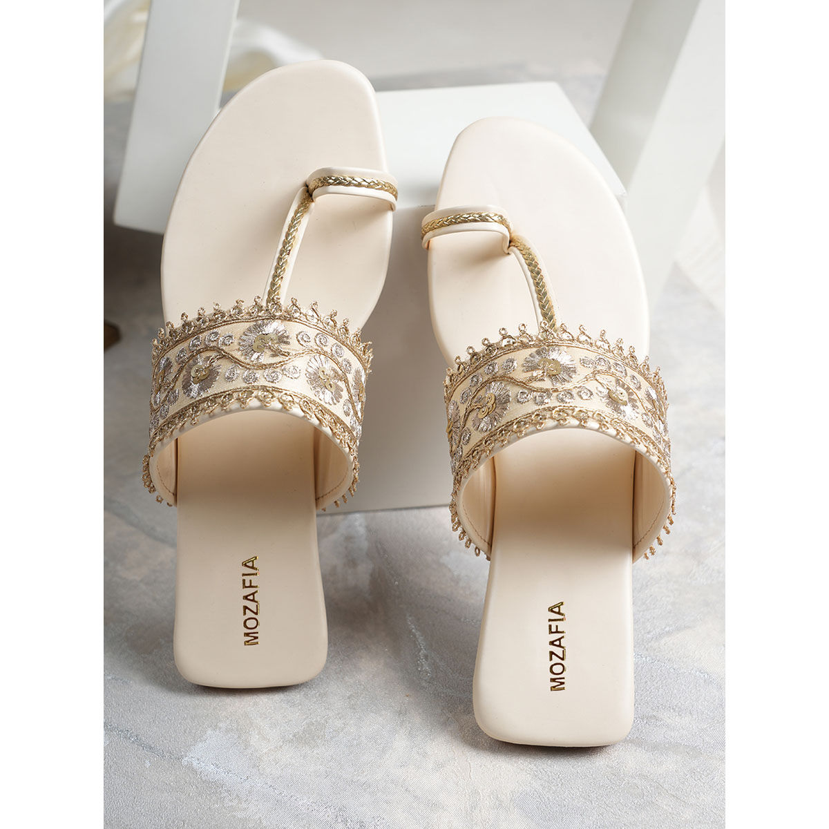 Buy MOZAFIA Women White Flats Online