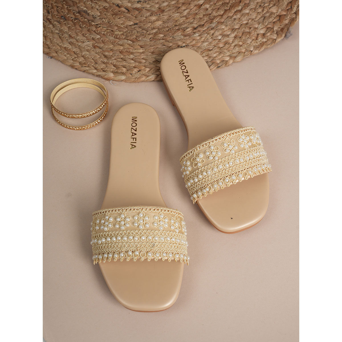 Buy MOZAFIA Women Gold Flats Online