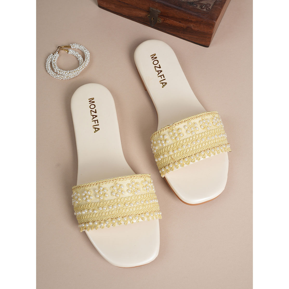Buy MOZAFIA Women White Flats Online