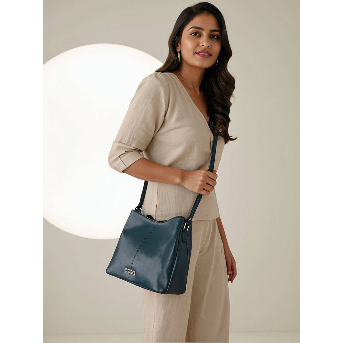 Toteteca Women Contemporary Teal Solid Sling Bag