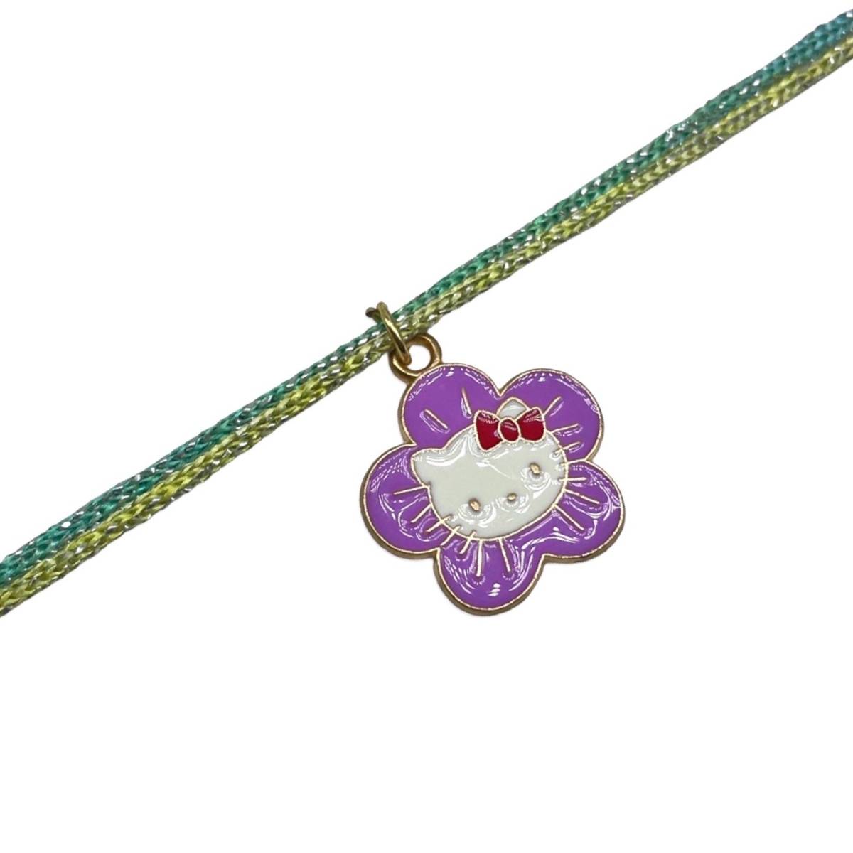 Buy Digital Dress Room Gold Plated Purple Flower/Cat Charm Rakhi For ...