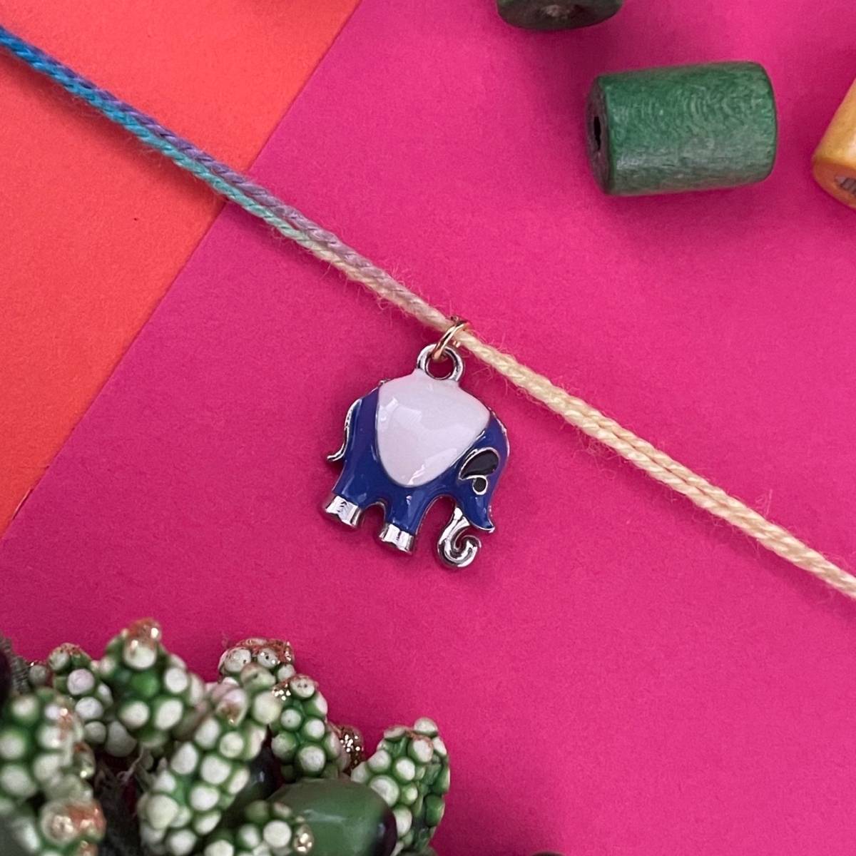 Digital Dress Room Gold Plated Blue Elephant Charm Rakhi For Raksha Bandhan