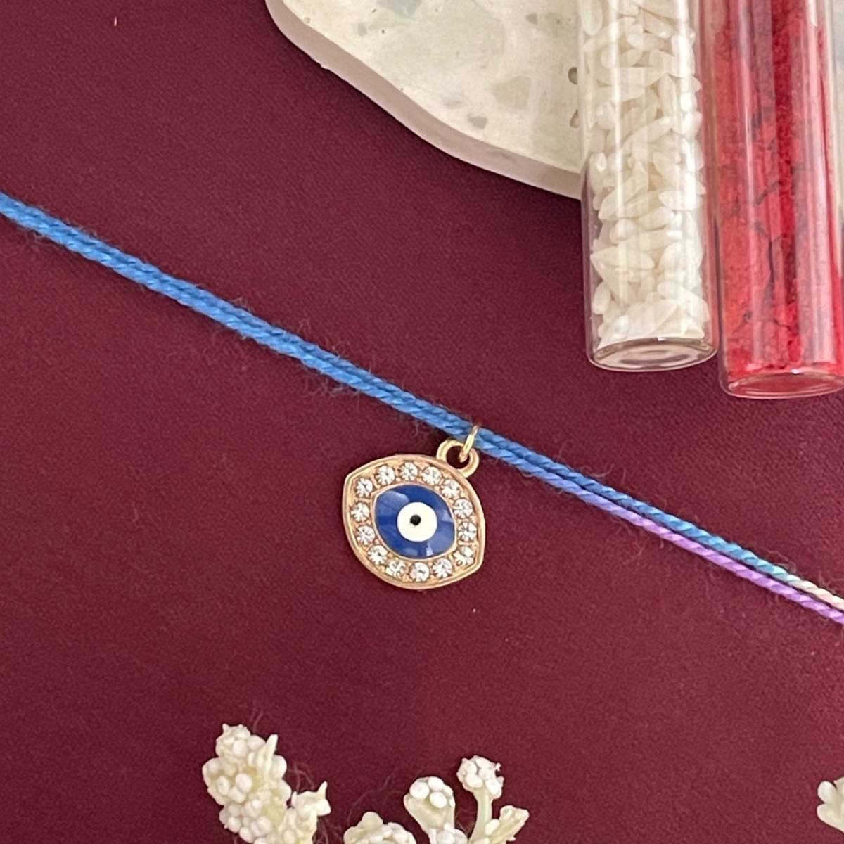 Digital Dress Room Gold Plated Ad Evil Eye Charm Rakhi For Raksha Bandhan