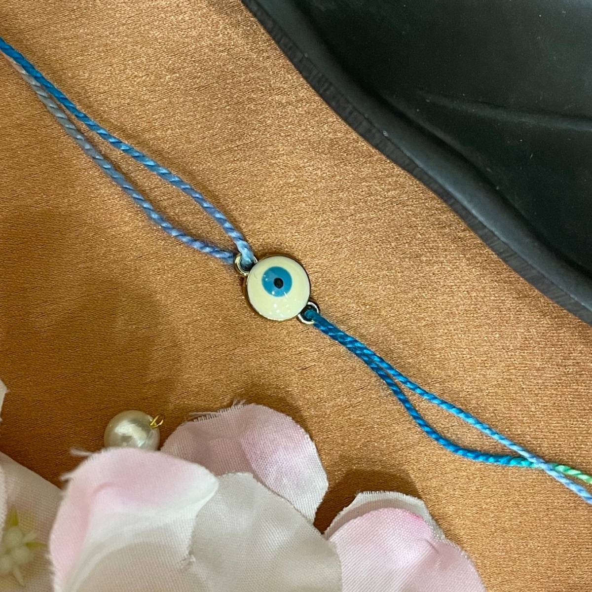 Digital Dress Room Gold Plated White Evil Eye Charm Pendant Rakhi For Raksha Bandhan,