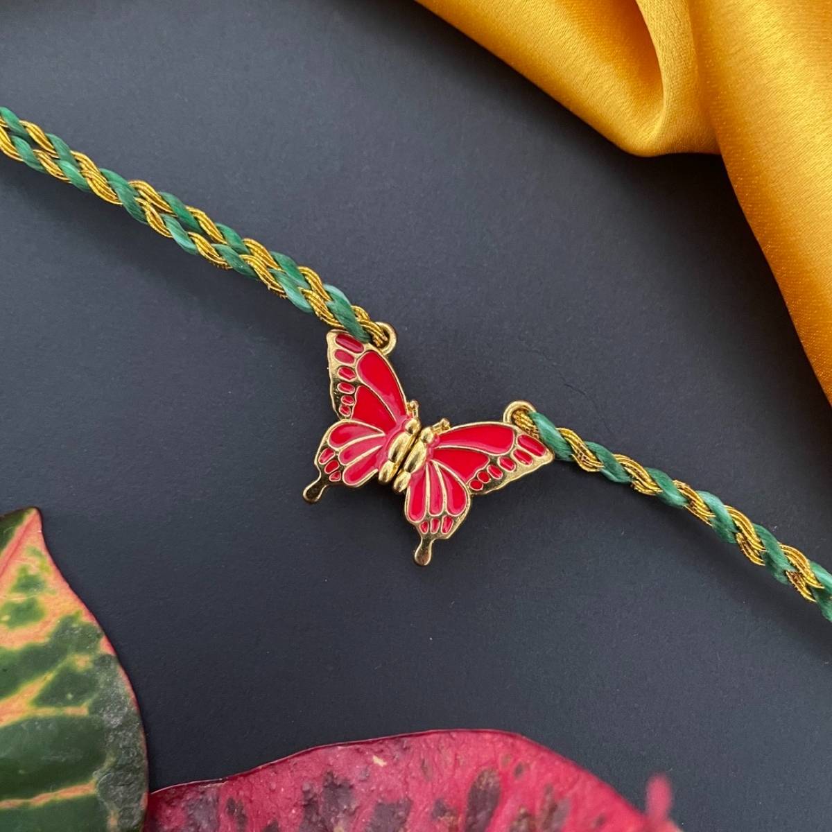 Digital Dress Room Gold Plated Red Butterfly Magnet Pendant Rakhi For Raksha Bandhan