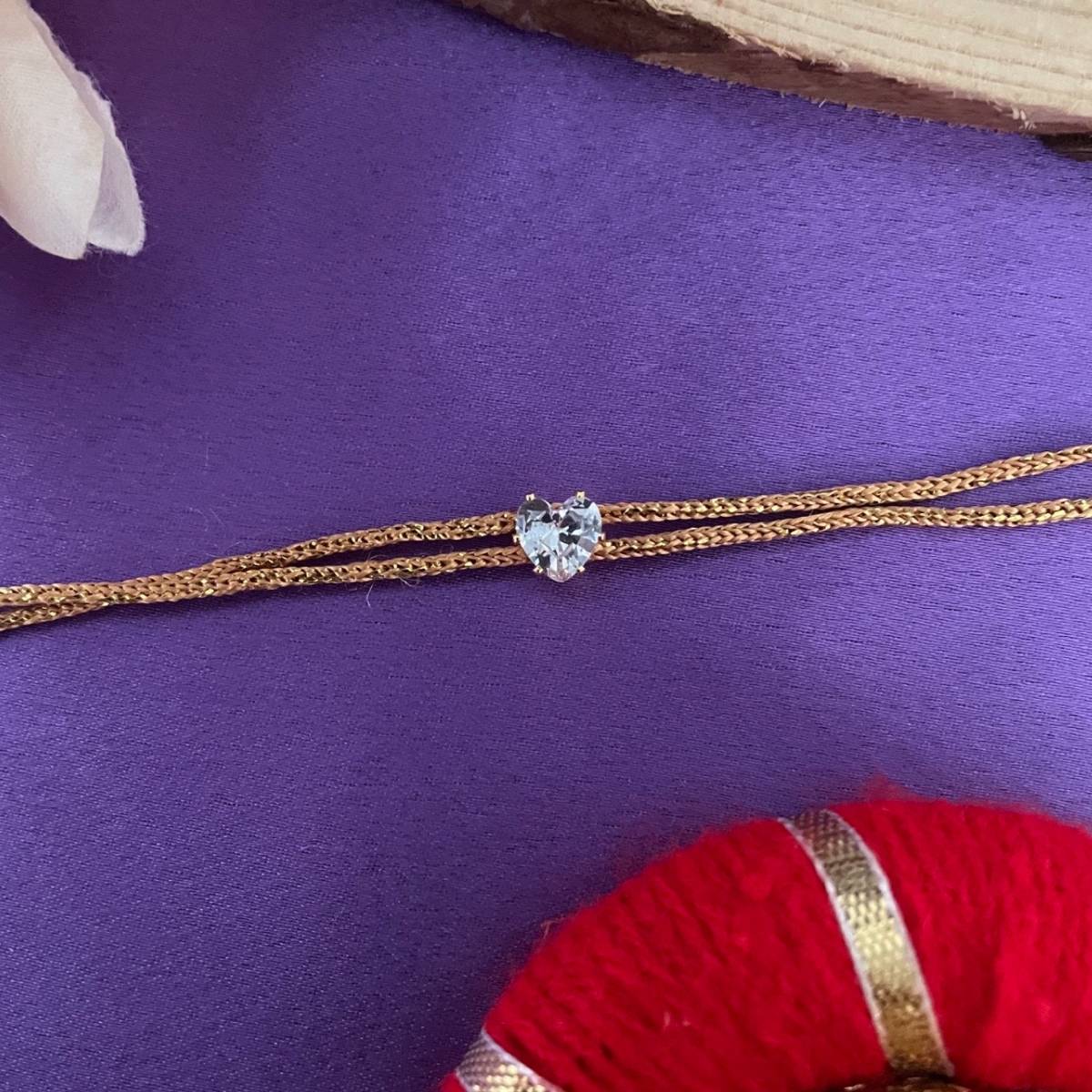 Digital Dress Room Gold Plated American Diamond Heart Pendant Rakhi For Raksha Bandhan