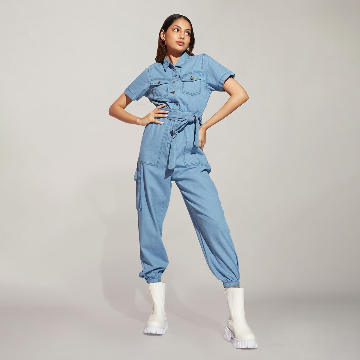 Mature woman wearing denim jumpsuit - a Royalty Free Stock Photo from  Photocase