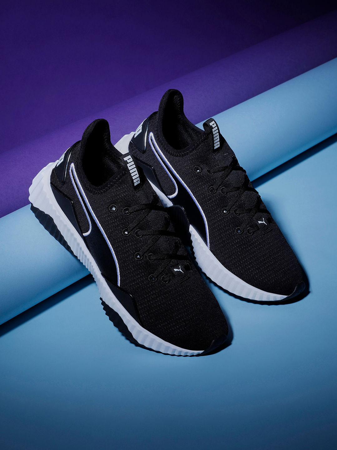 Puma defy outlet trainers