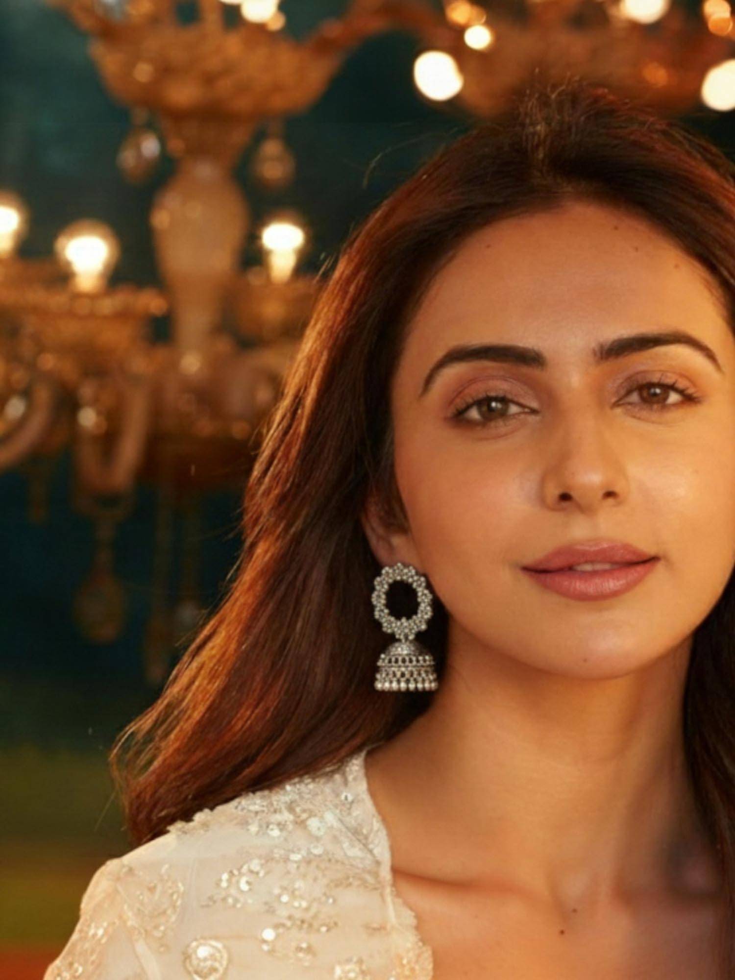 Accessher Oxidised Silver Floral Motif Jhumka Earrings
