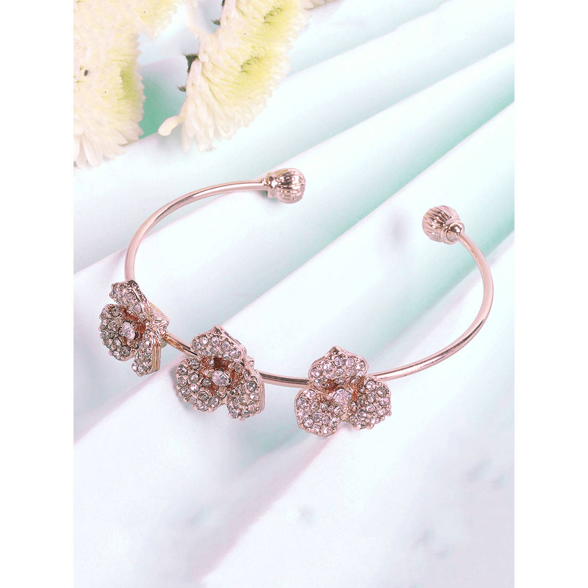 Estele Rose Motif Cuff Bracelet: Stylish Rosegold Plated with Floral Detailing