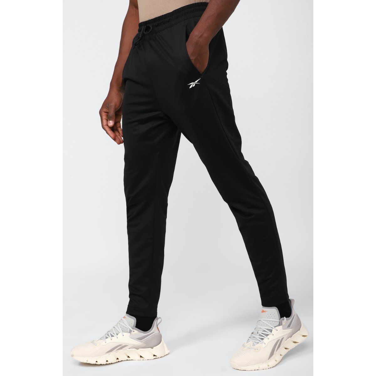 Reebok men's wor knit pants online