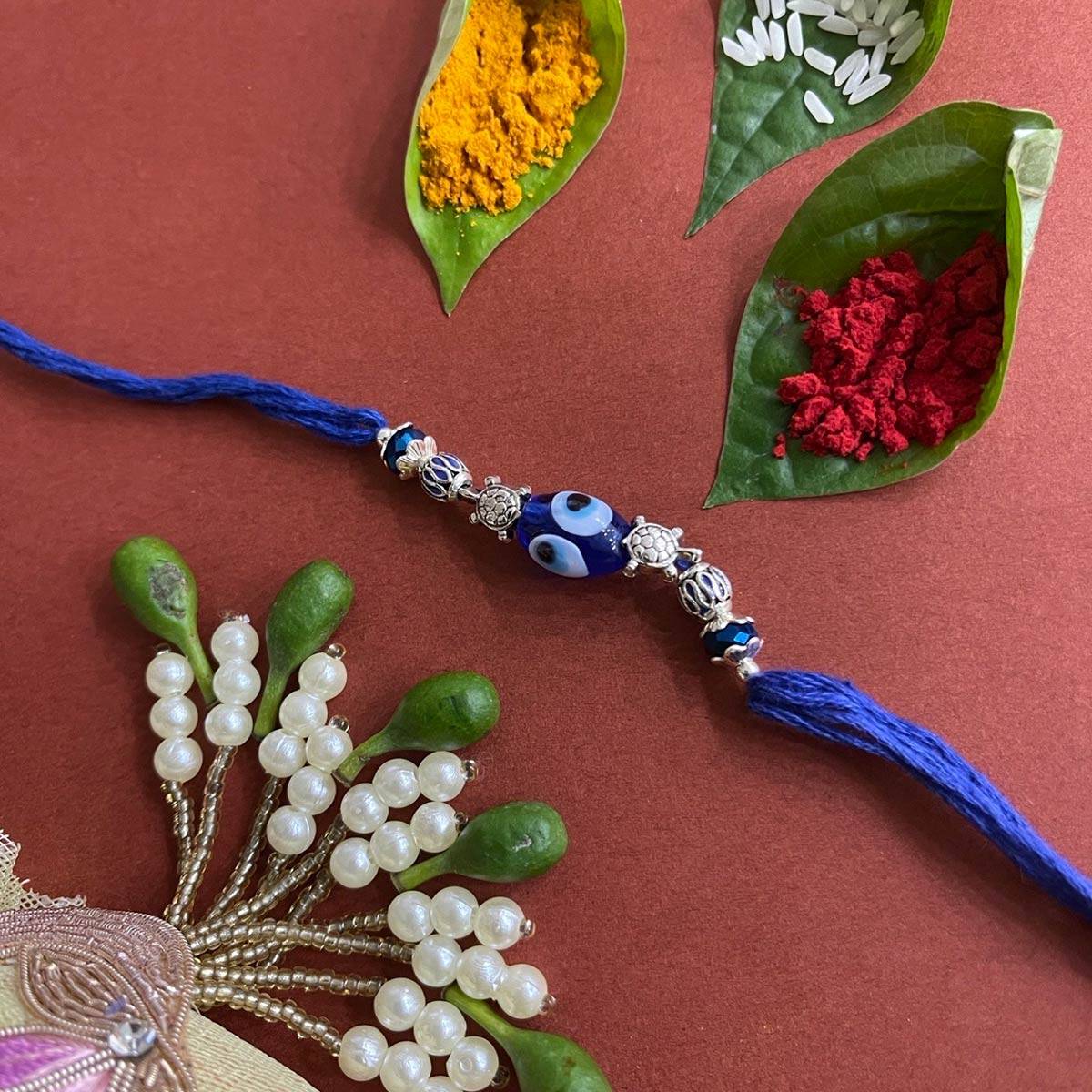 Digital Dress Room Beautiful Designer Rakhi TortoiseEvil Eye Charm Dark Blue Thread Rakhi