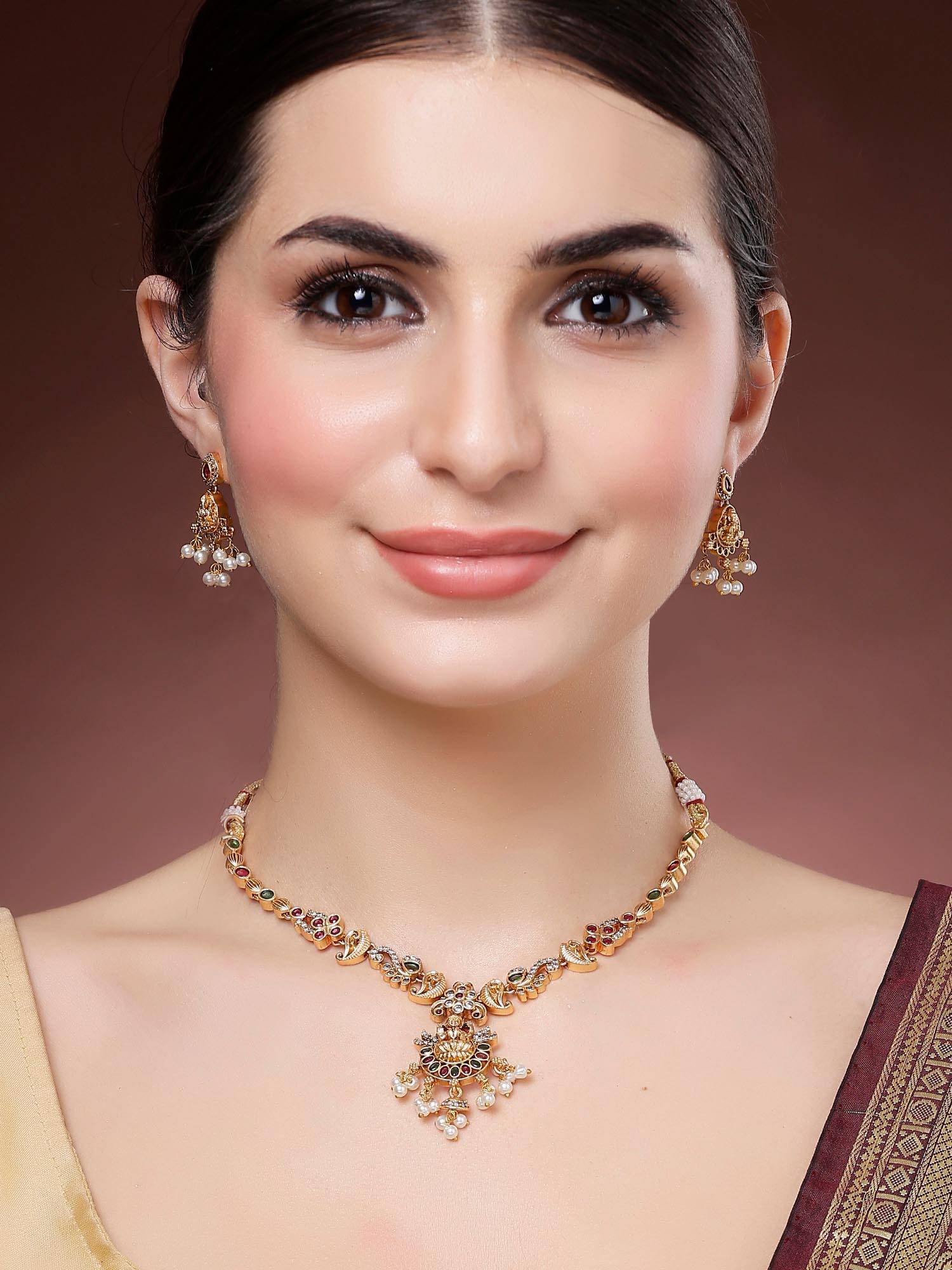 Karatcart Women Multi-Color Laxmi Mata Gold Plated Stone Studded Temple Jewellery Set