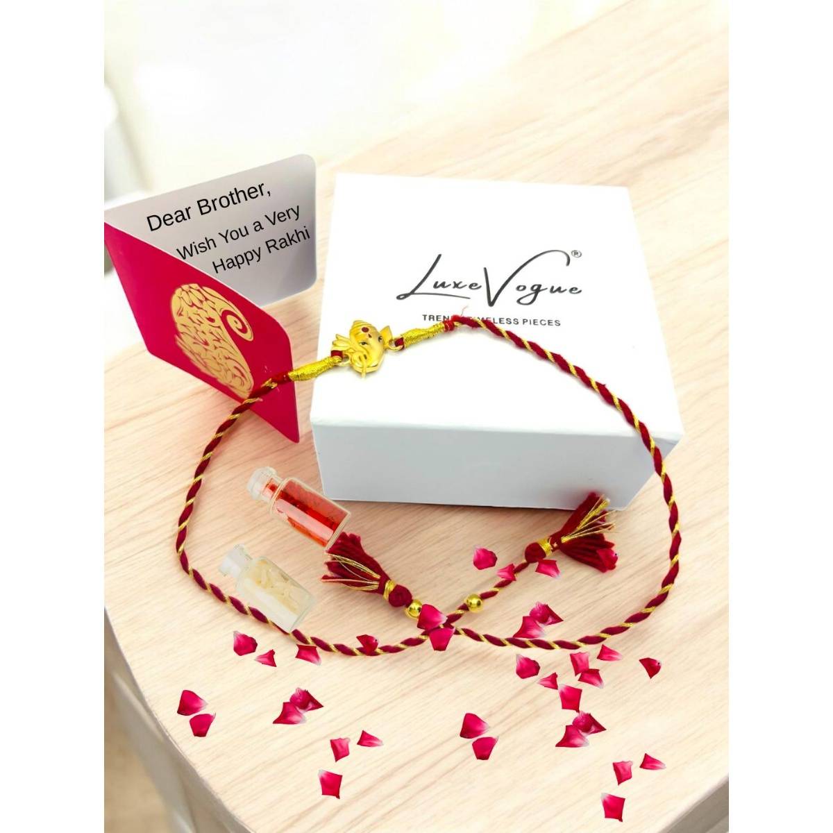 LuxeVogue 925 Silver Golden Lord Ganesha Rakhi Gift Set