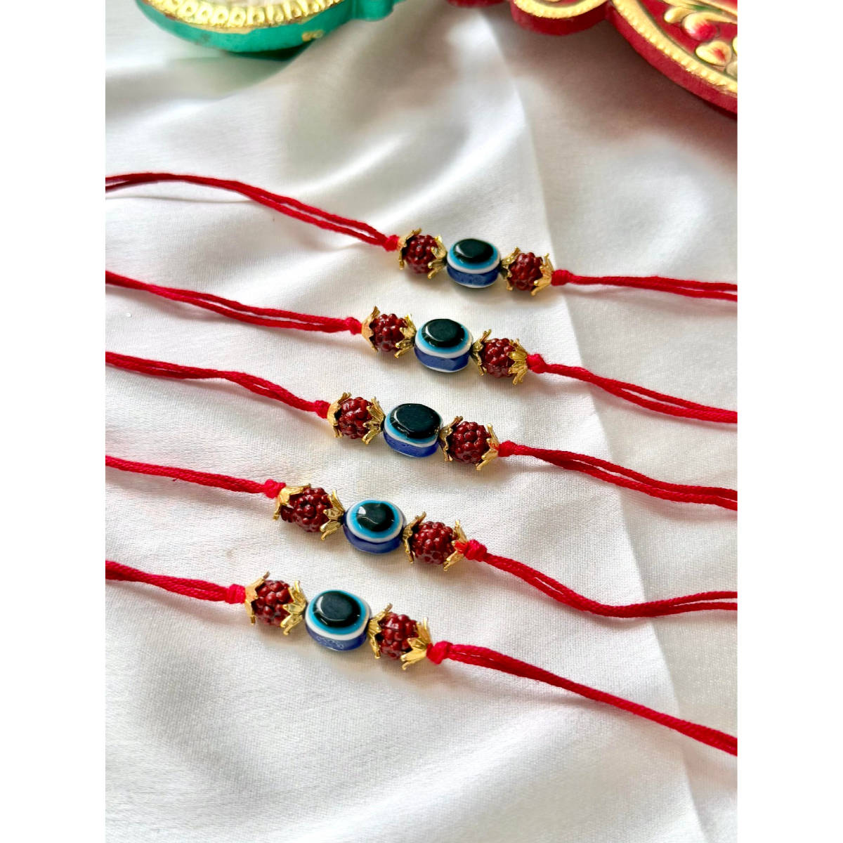 ISHKAARA Multi-Color Rudraksh Thread Rakhis (Pack of 5)