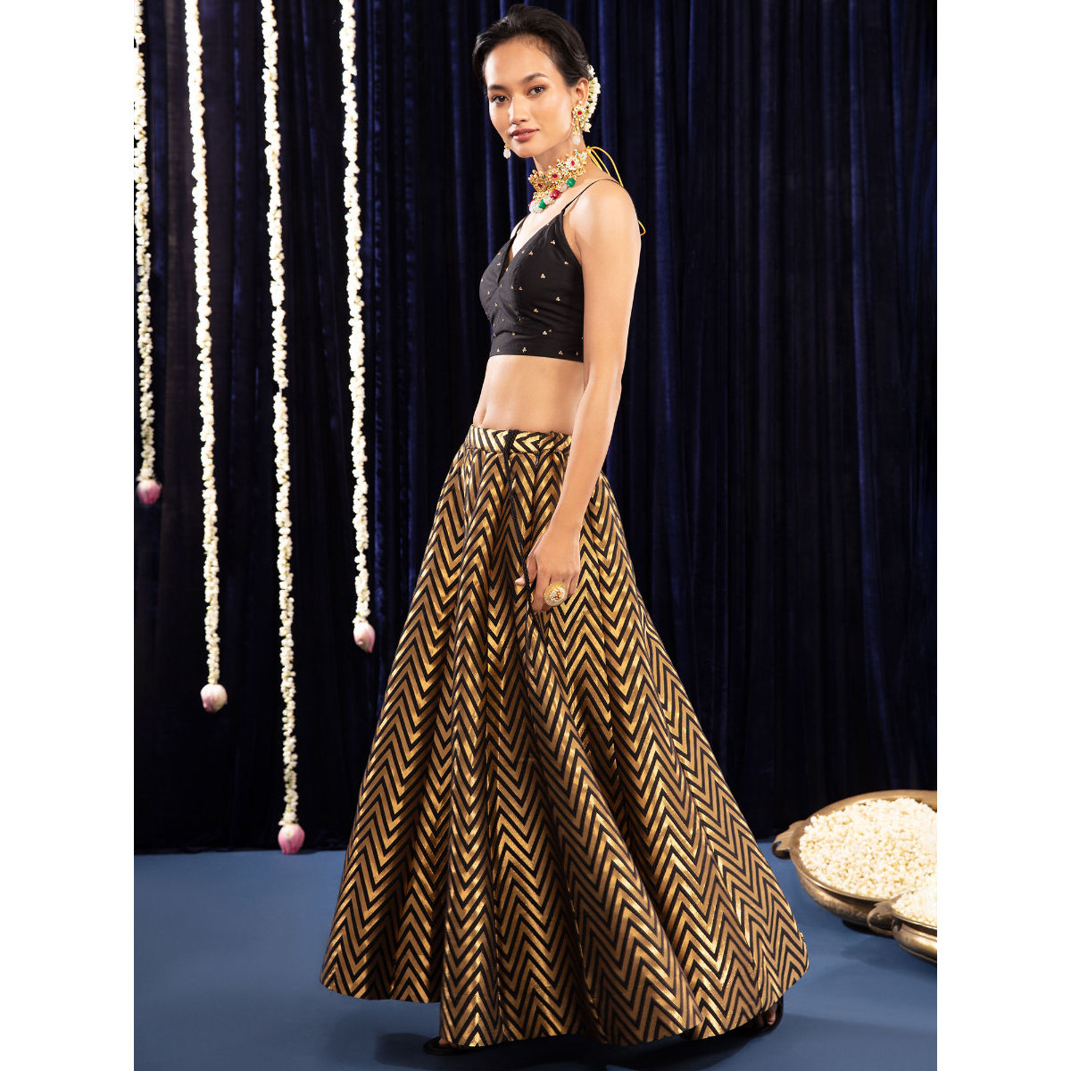 Black crop top 2025 with golden skirt