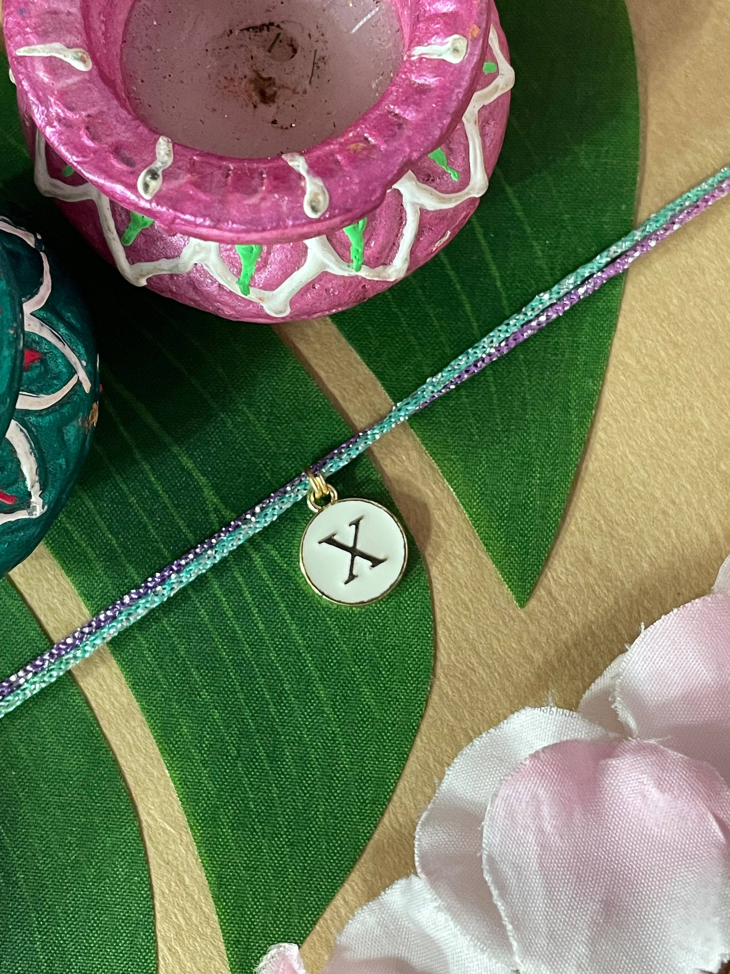 Digital Dress Room X Letter White Initial Coin Pendant Thread Rakhi