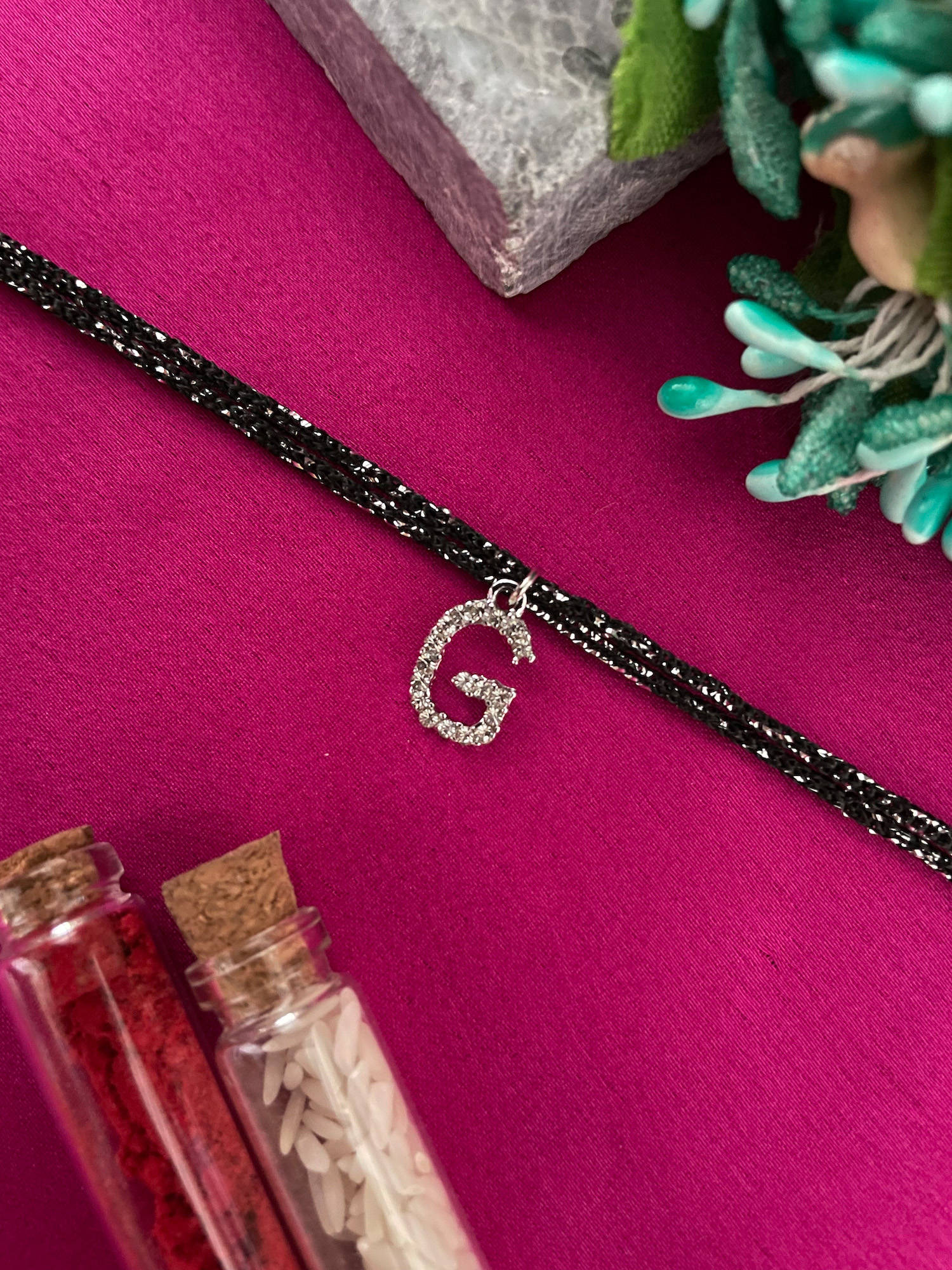 Digital Dress Room G Letter Silver Plated AD Initial Black Thread Rakhi with Roli Chawal