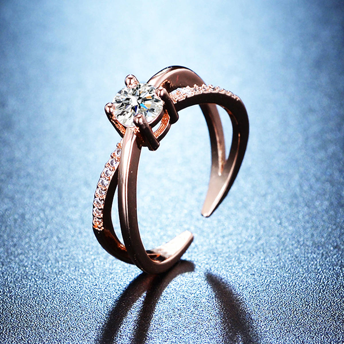 Designs & You Rose Gold Plated American Diamond Studded Cross Shape Adjustable Finger Ring