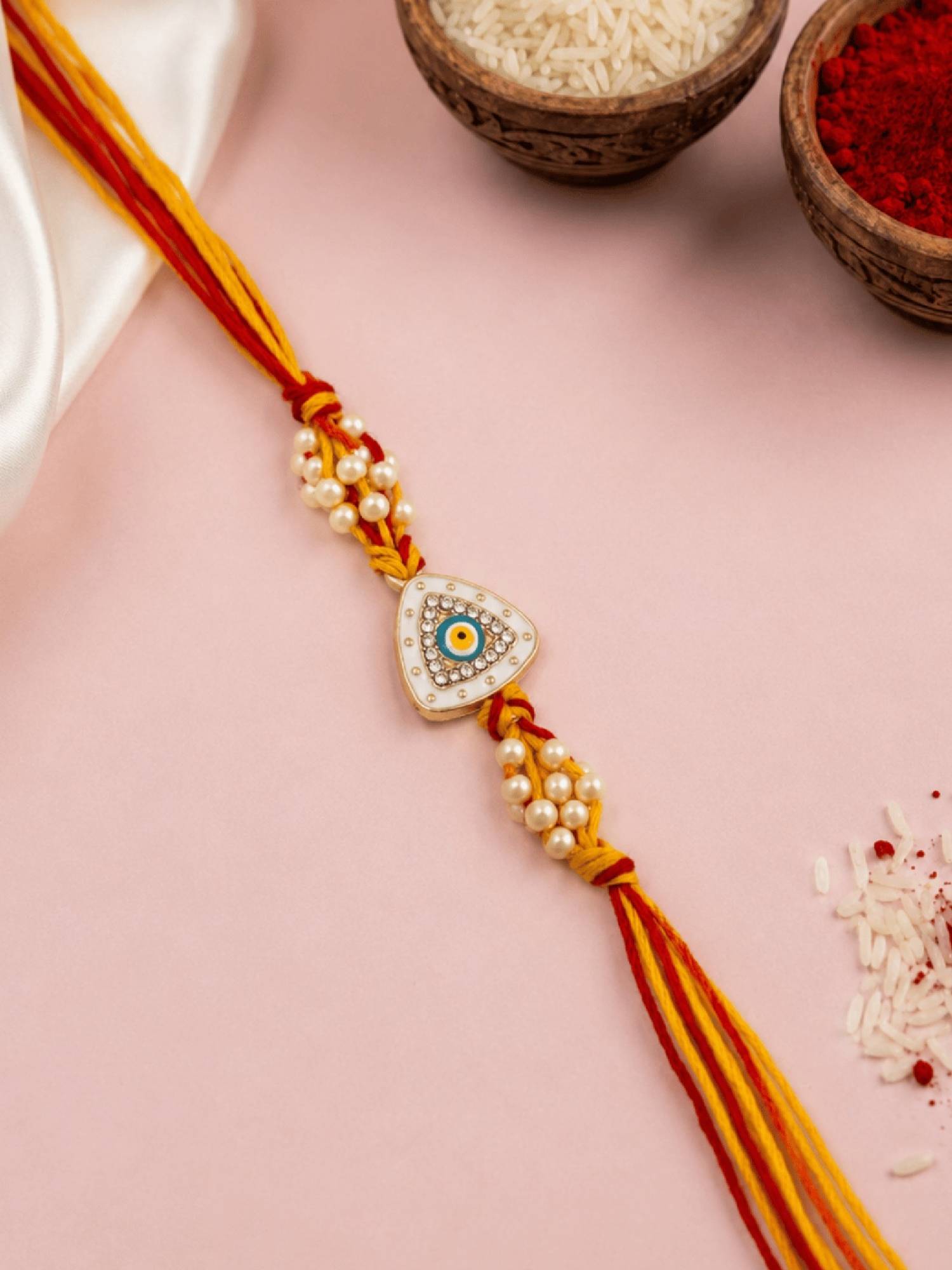 ISHKAARA White Triangle Evil Stone Rakhi for Raksha Bandhan