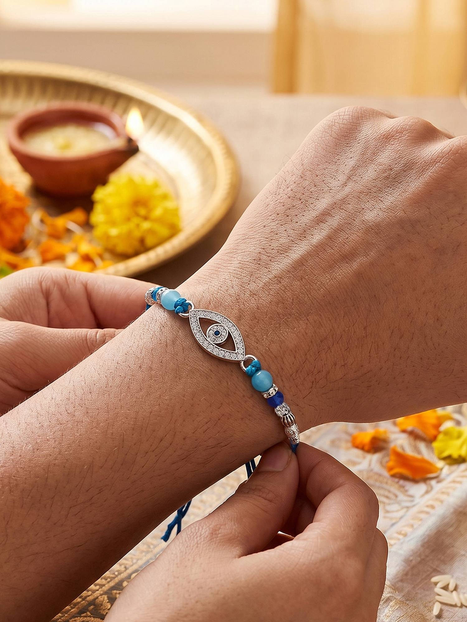 TOUCH925 925 Silver Evil Eye Rakhi for Brother with Sparkling Stones and Blue Beads