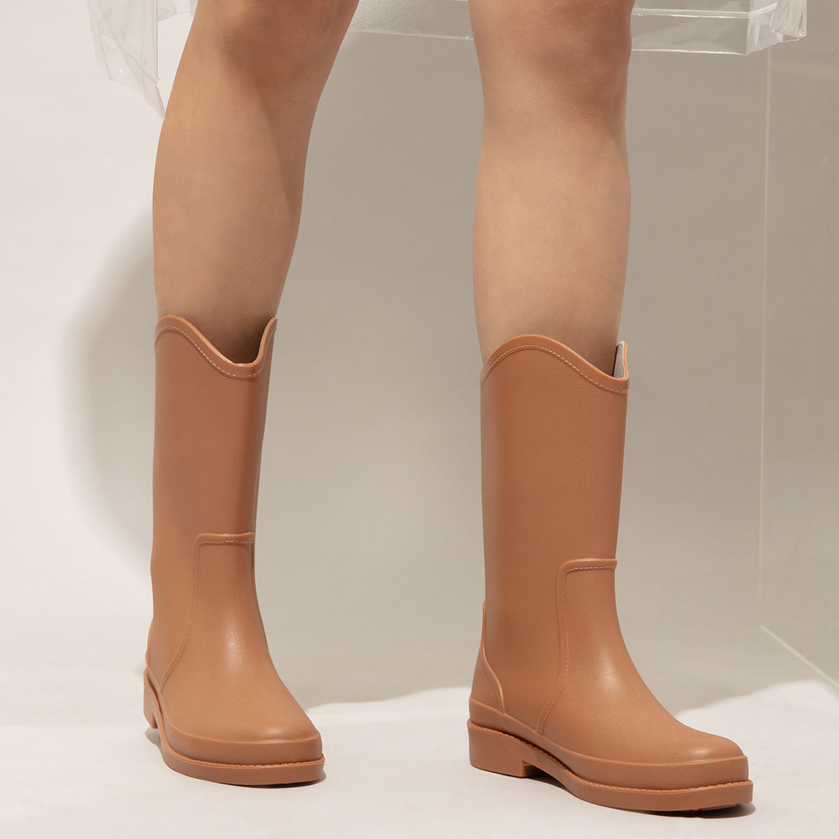 Calf length store rain boots