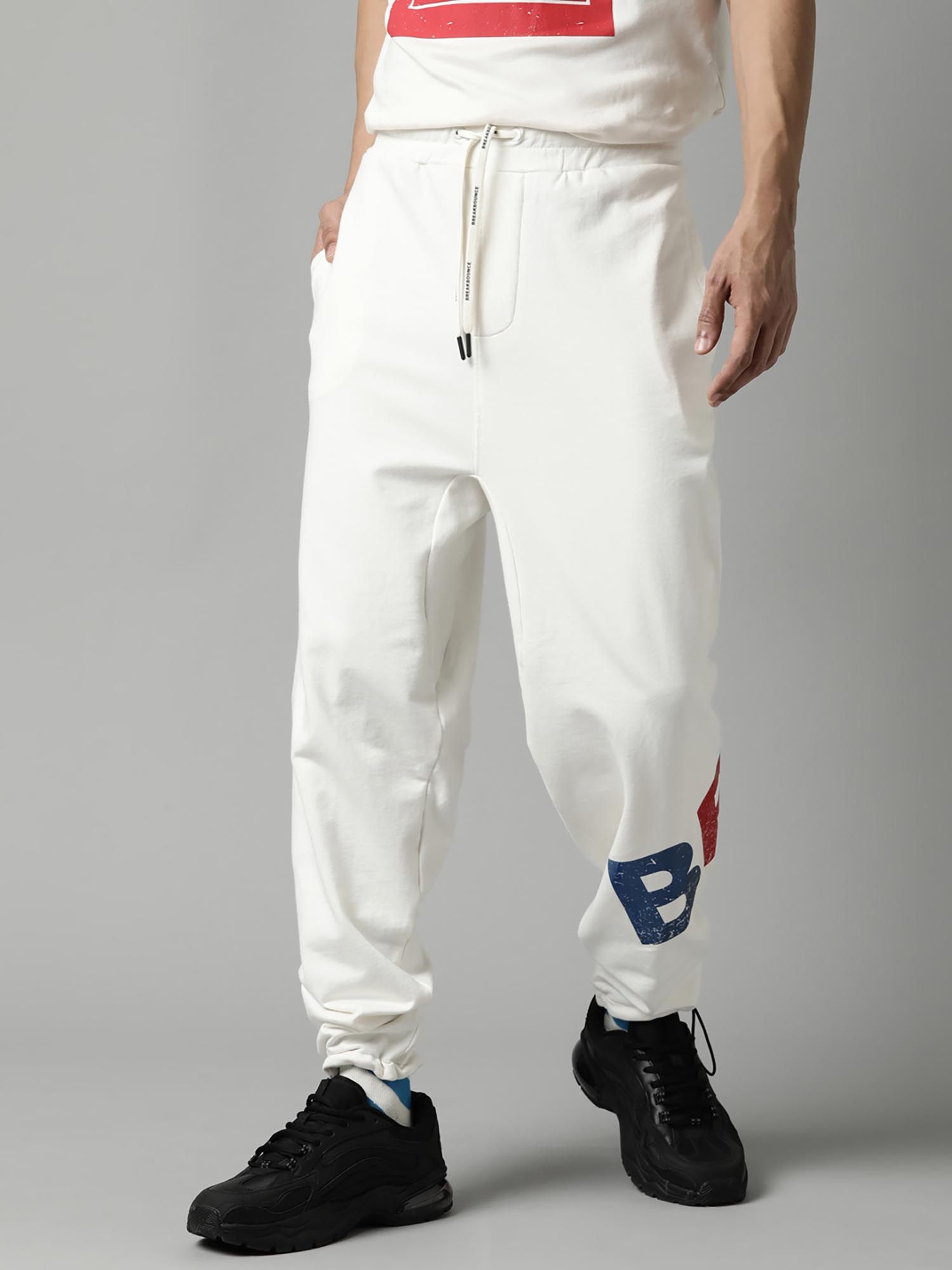 Buy Breakbounce Men Printed Loose Fit Off White Knitted Joggers Online