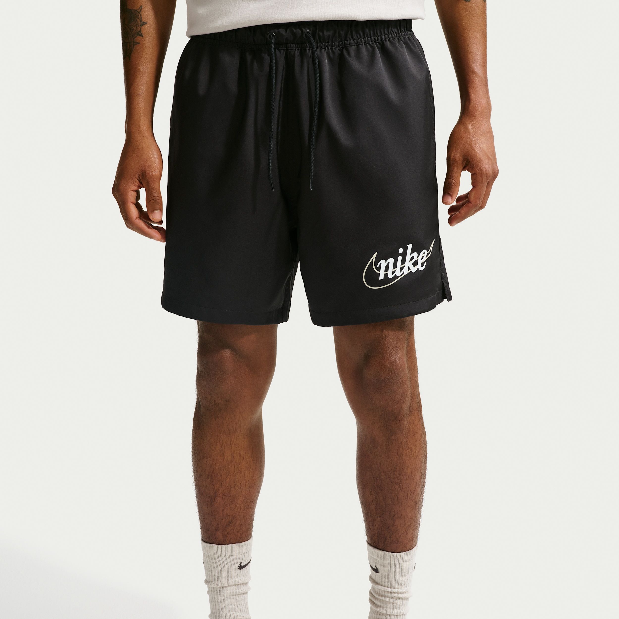 nike sportswear men's woven flow shorts