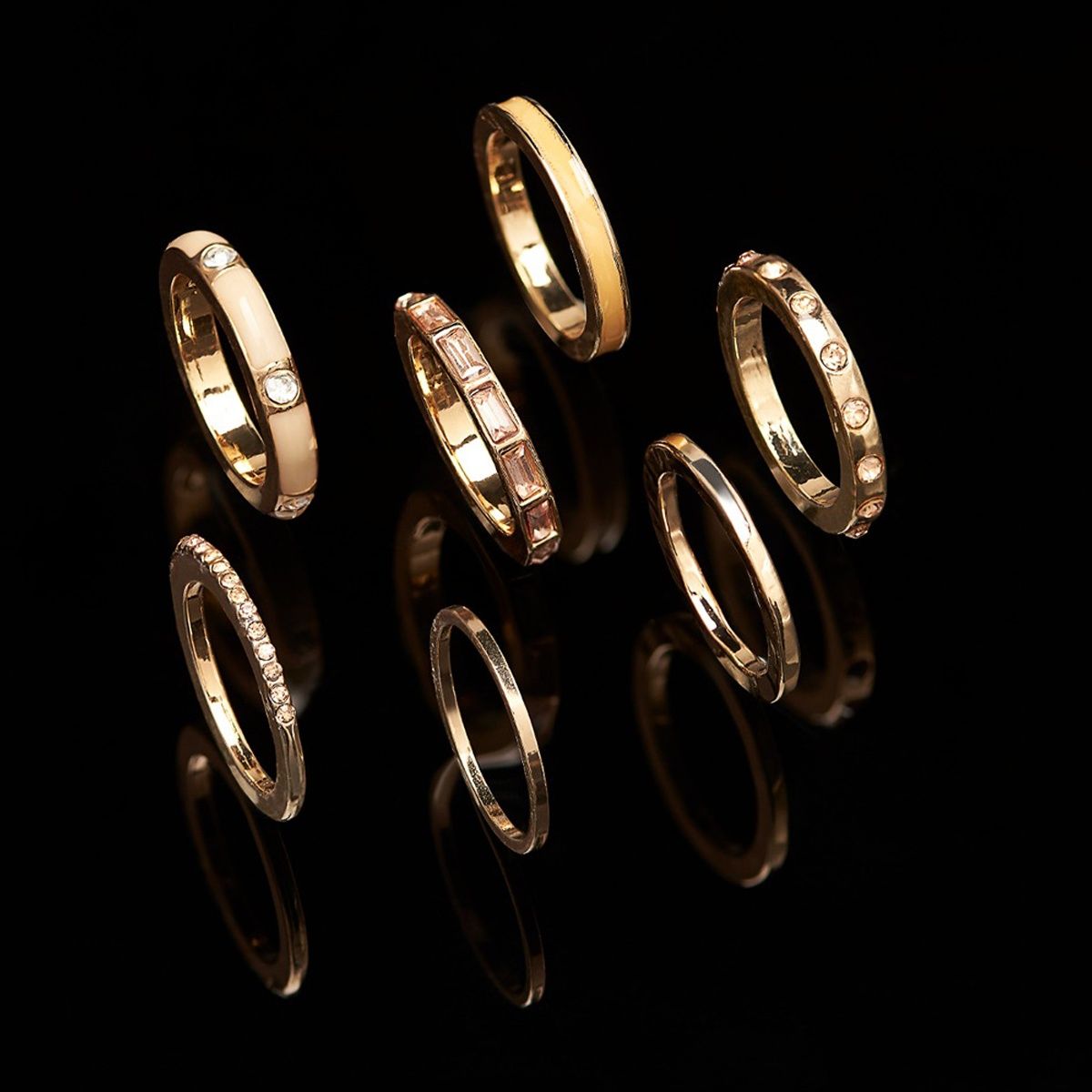 Buy Zaveri Pearls Gold Tone Set of 7 Stunning Stackable Finger Rings