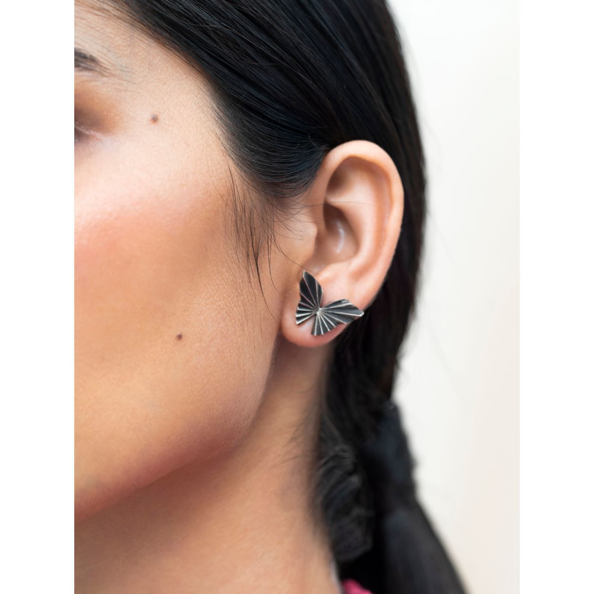 Half butterfly earrings shop studs
