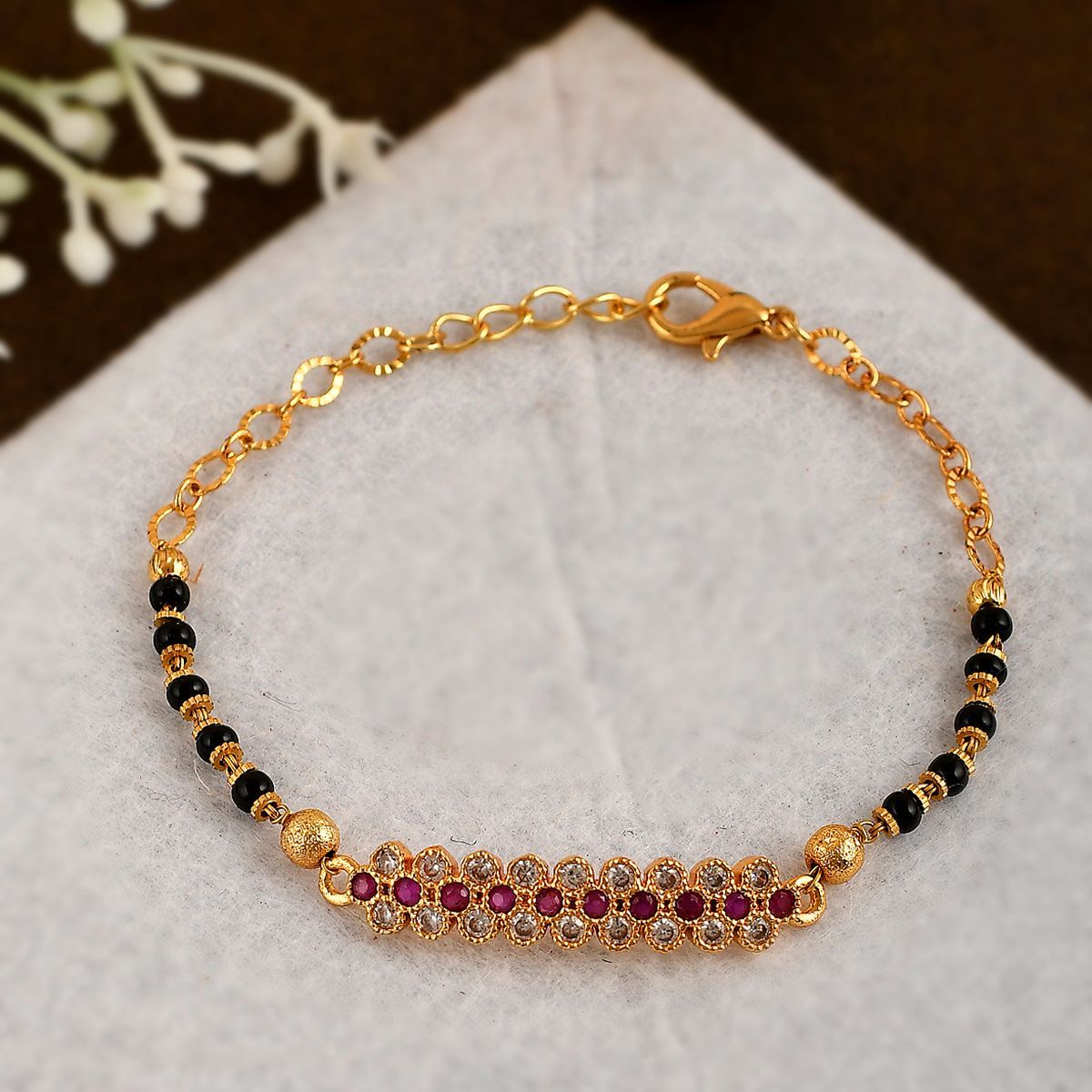Buy Rose Gold-Toned & Black Bracelets & Bangles for Women by Jewels galaxy  Online | Ajio.com