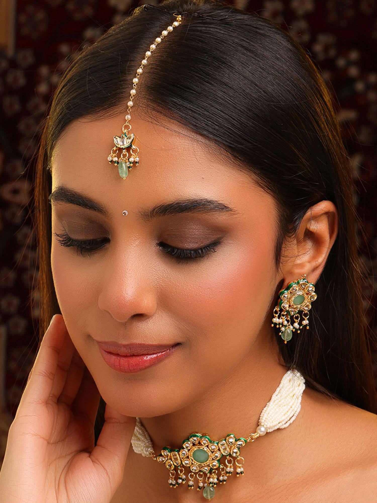 Ruby Raang Studio Green-Gold Kundan Necklace with Earrings and Maang Tikka