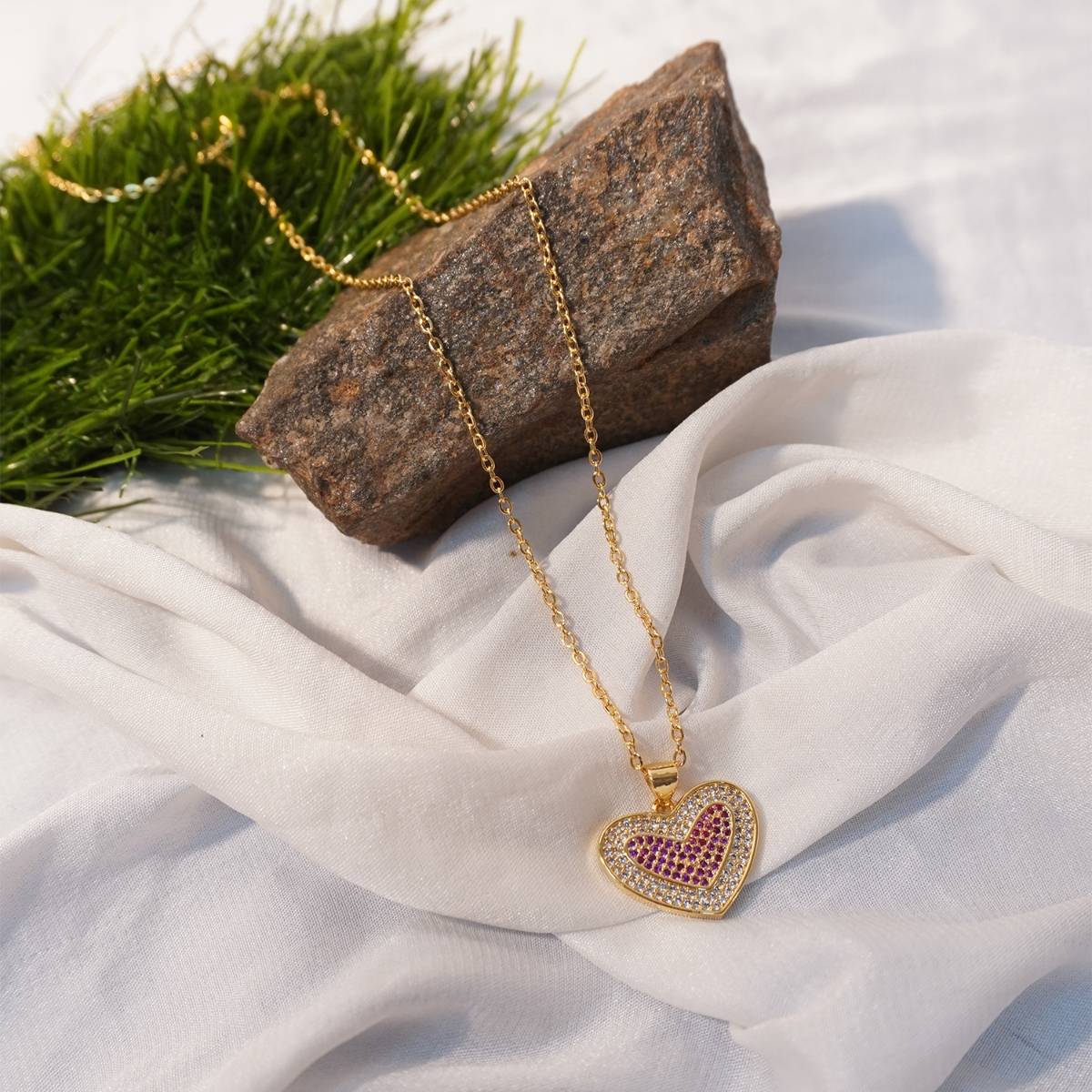 Niscka Golden Pink Cubic Zircons Heart Studded Chain Pendant