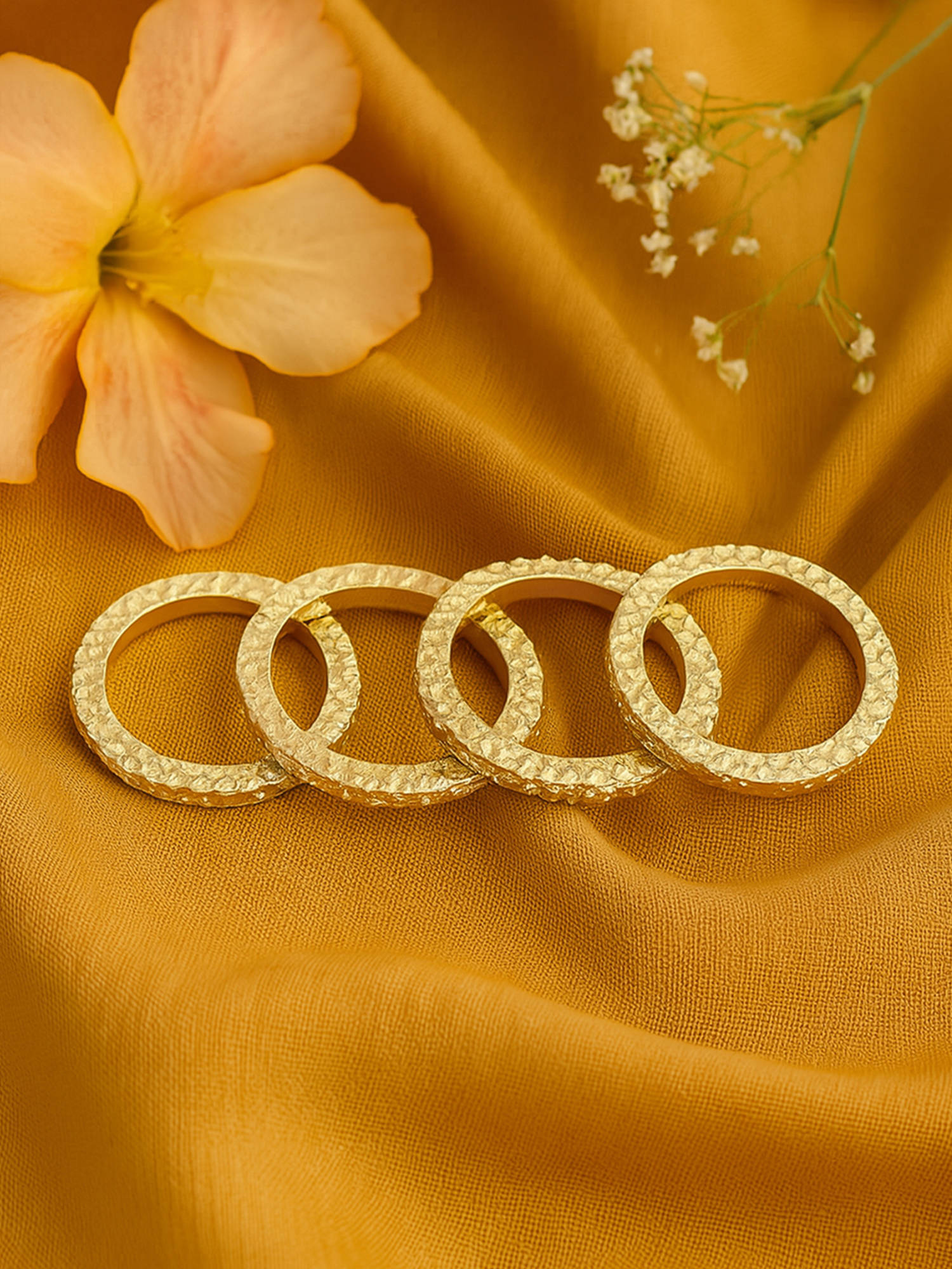 Estele Gold Plated Gorgeous Circular Design (Pack of 4 )Beaten Gold Finger Rings for Women