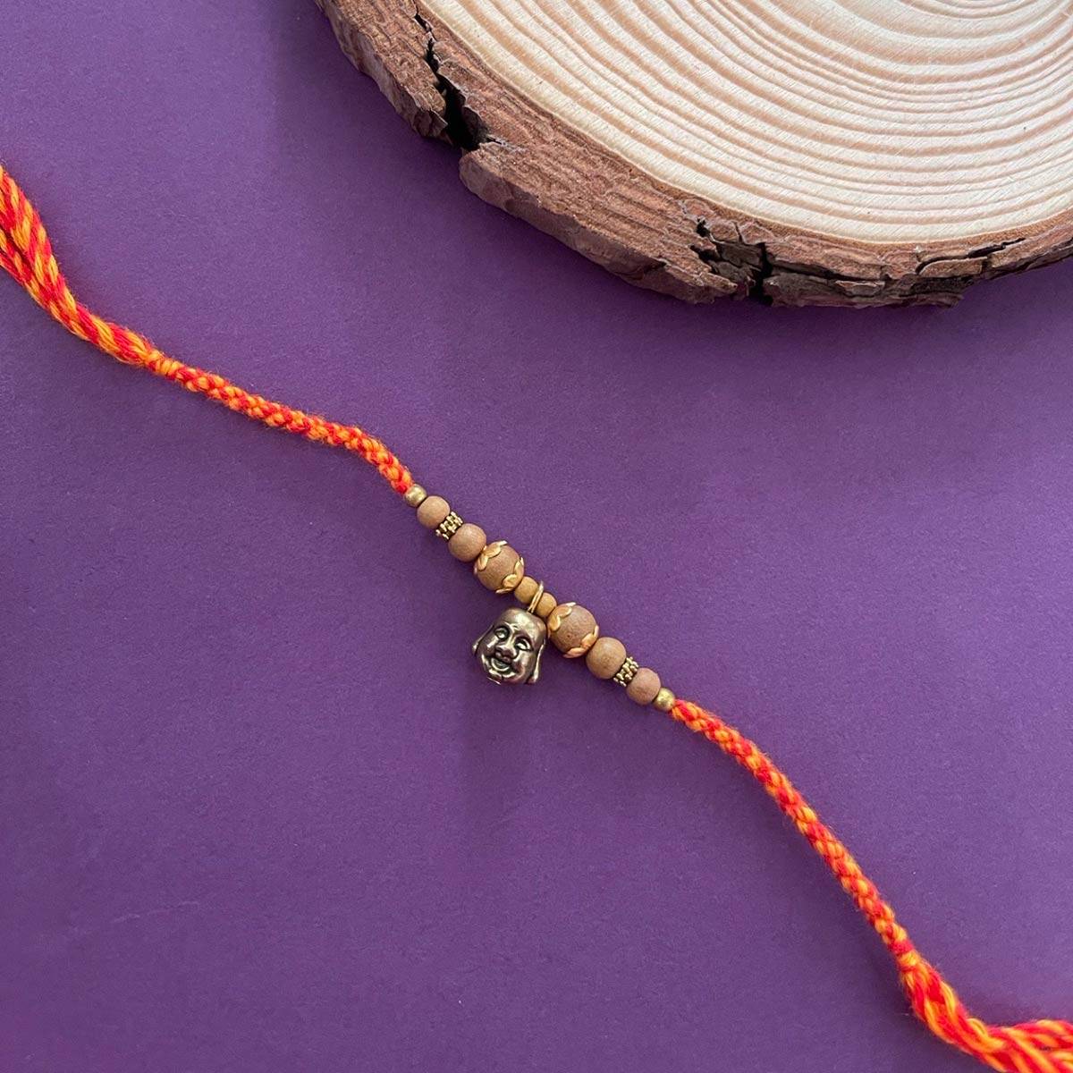 Digital Dress Room Designer Chandan Rakhi Laughing Buddha Face Criss Cross Thread Rakhi