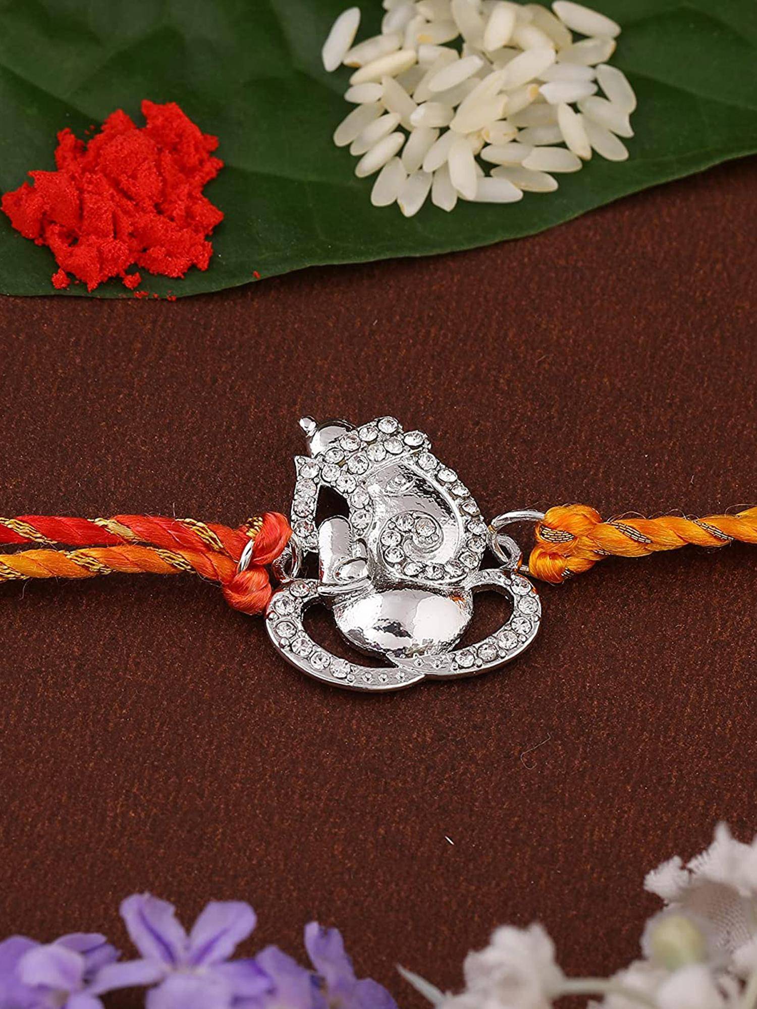 Estele Rhodium Plated Divine Ganesh Rakhi With Austrian Crystals & Silk Thread