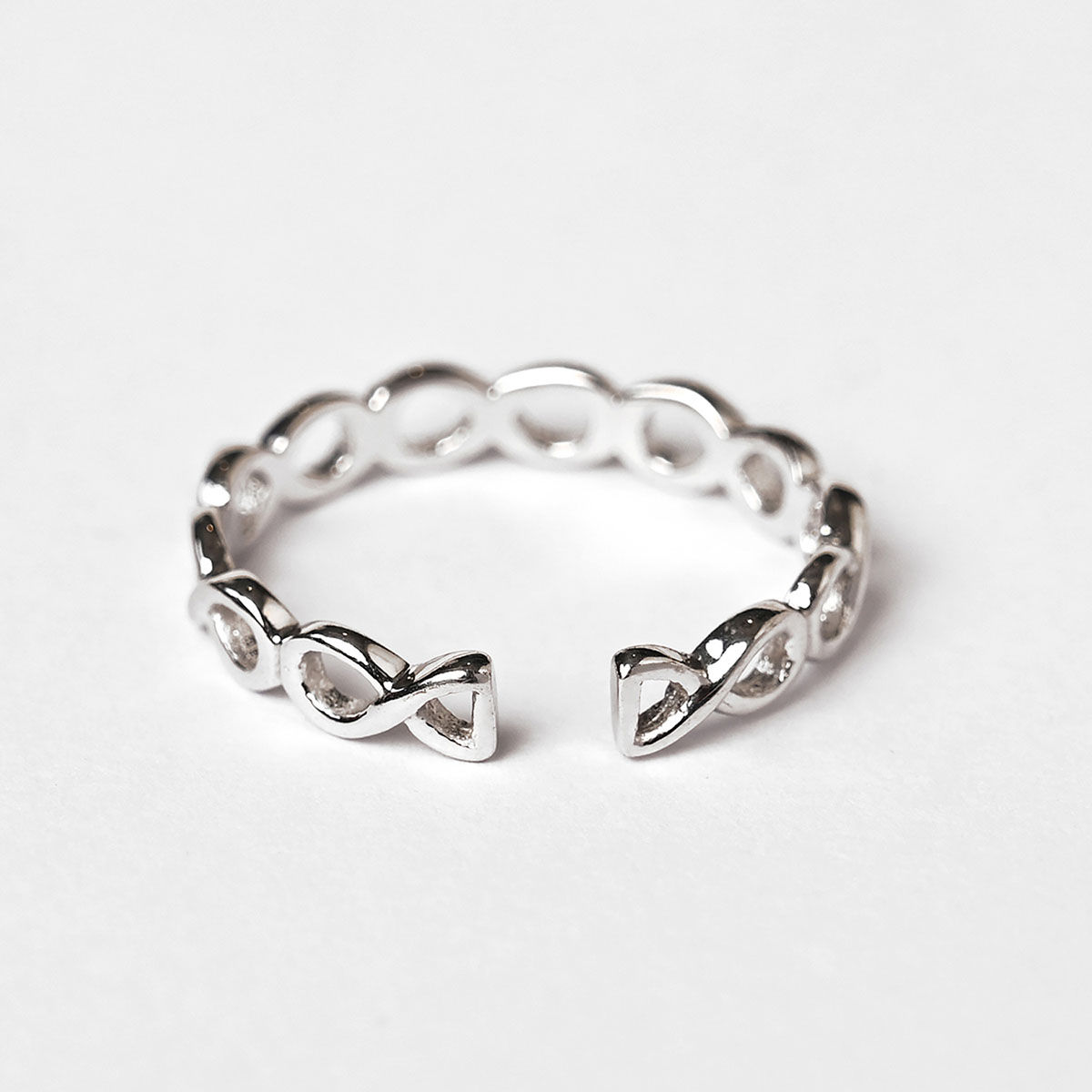 Infinity thumb ring top
