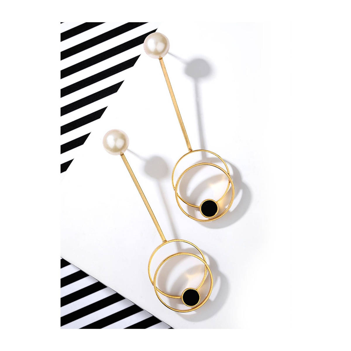 Suhani Pittie Gold Toned Circle On Circle Pendulum Earrings with Black Perspex & Pearl Detail