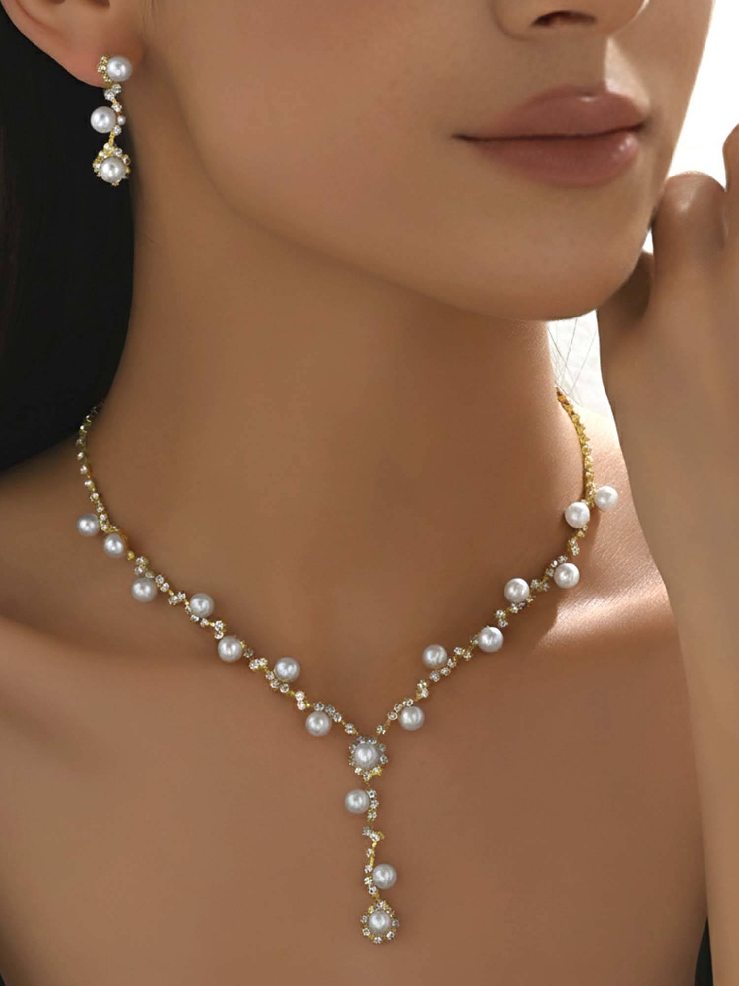 Peora Women Gold Plated Pearl and Cubic Zirconia Jewellery Set
