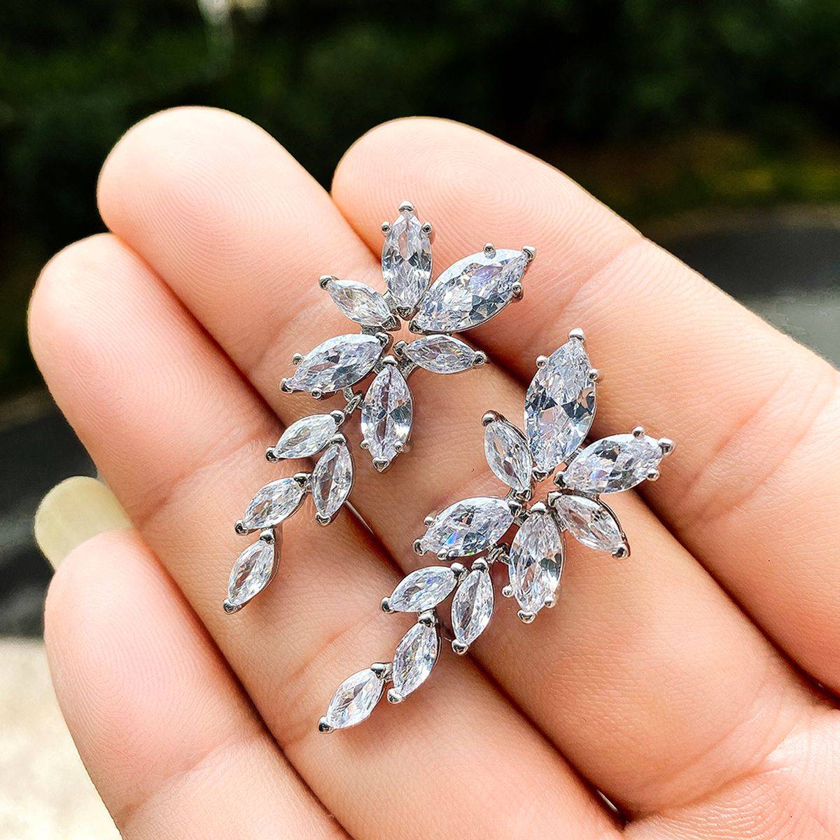 Designs & You Silver Plated American Diamond Floral Themed Drop Earrings