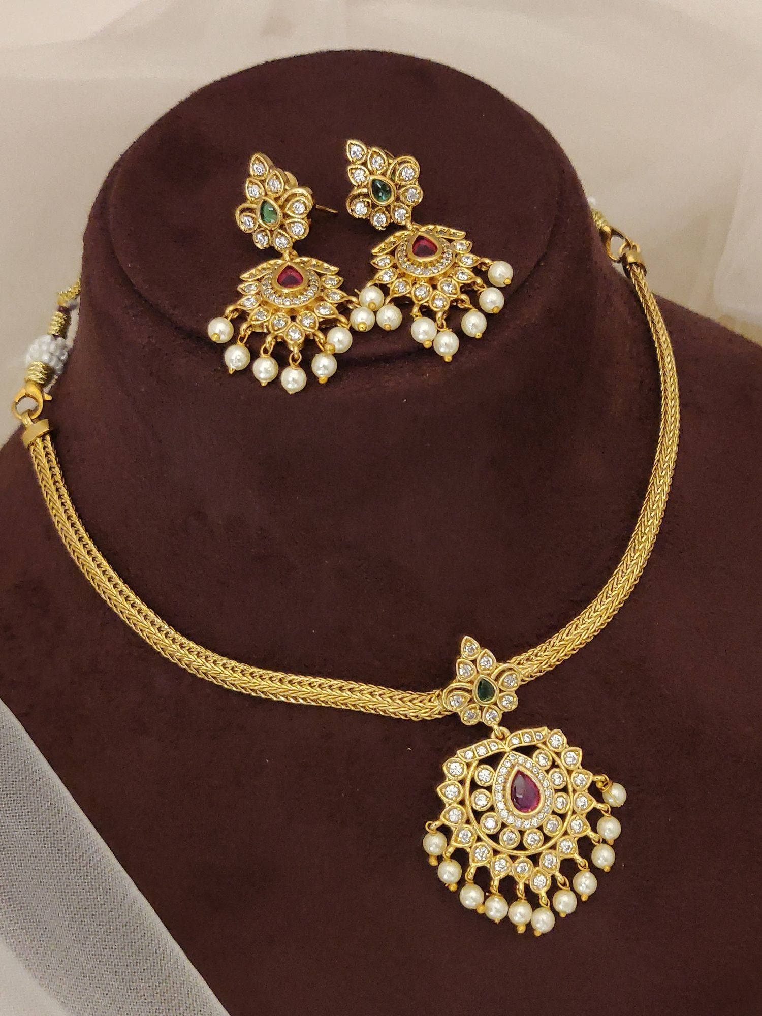 Abdesigns Multi-Color Elegant Gold Plated American Diamond Necklace with Earrings