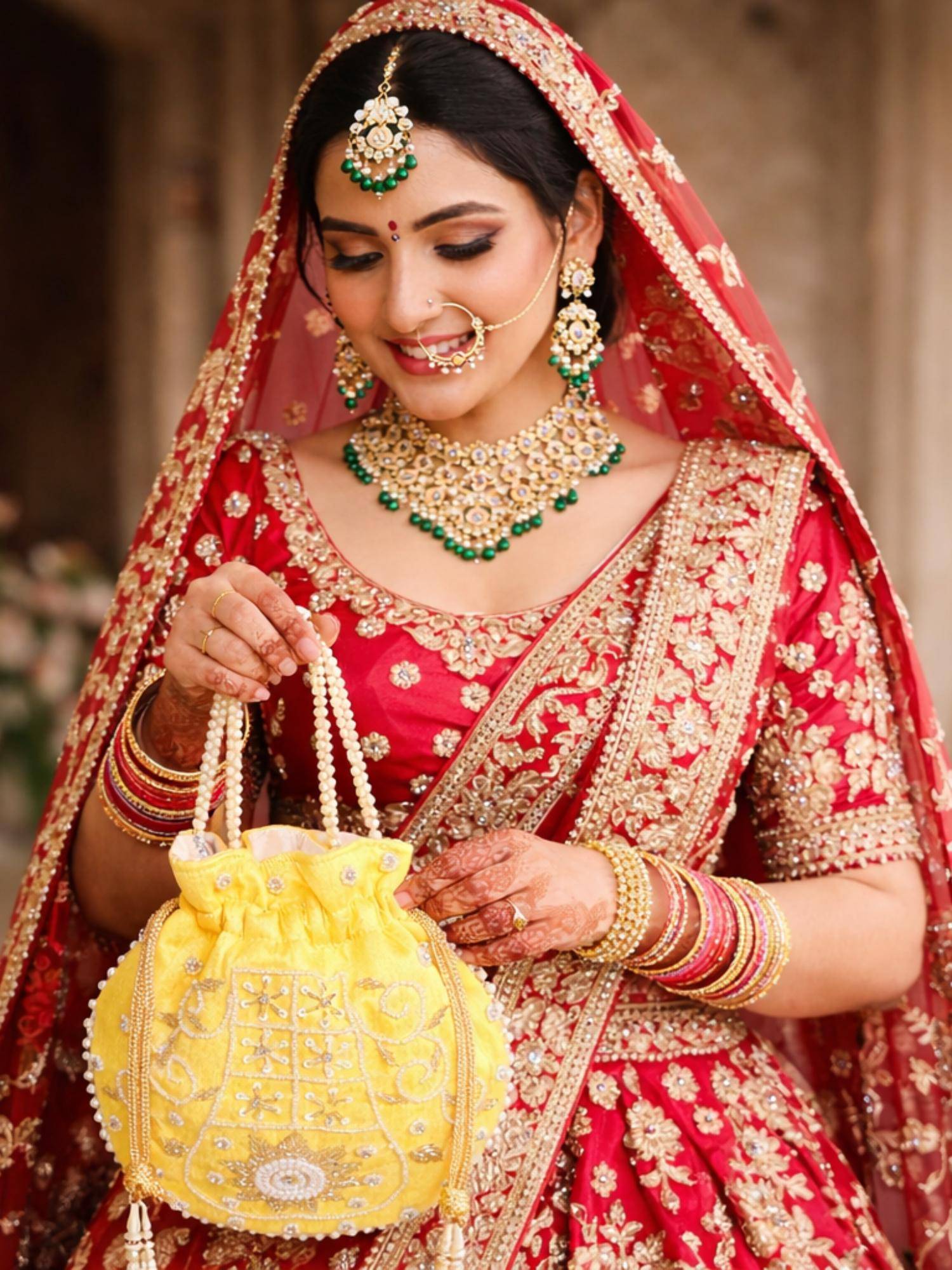 YELONA Women's Designer Potli Bag with Beaded Handle - Pastel Yellow