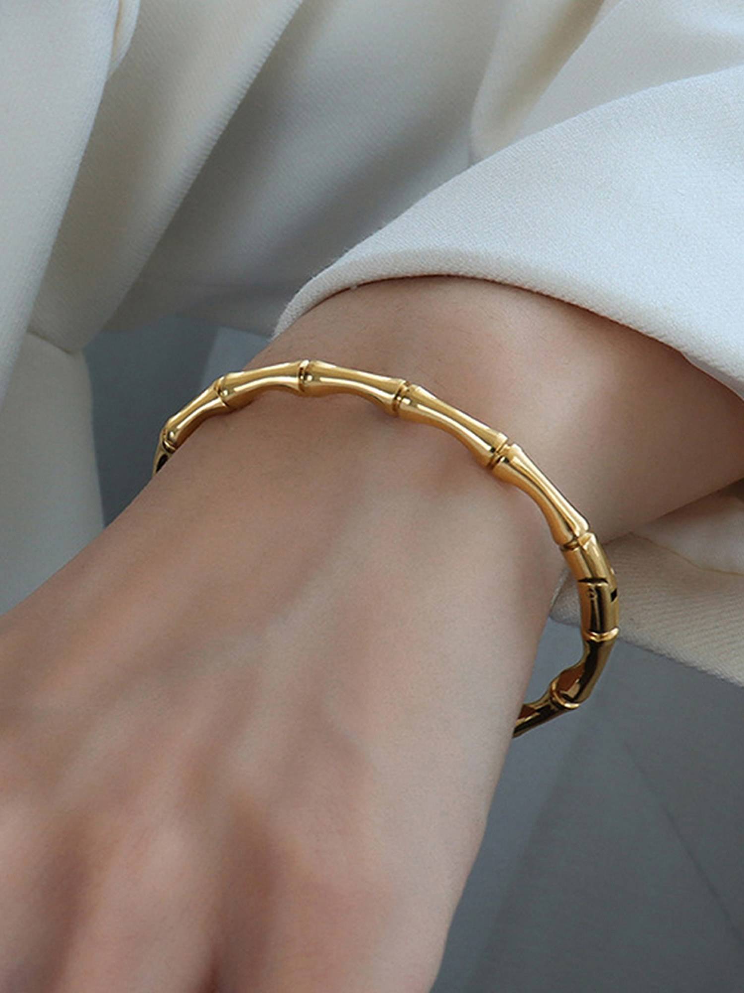 Jewels Galaxy Stainless Steel Gold Plated South Korean Anti Tarnish Bangle