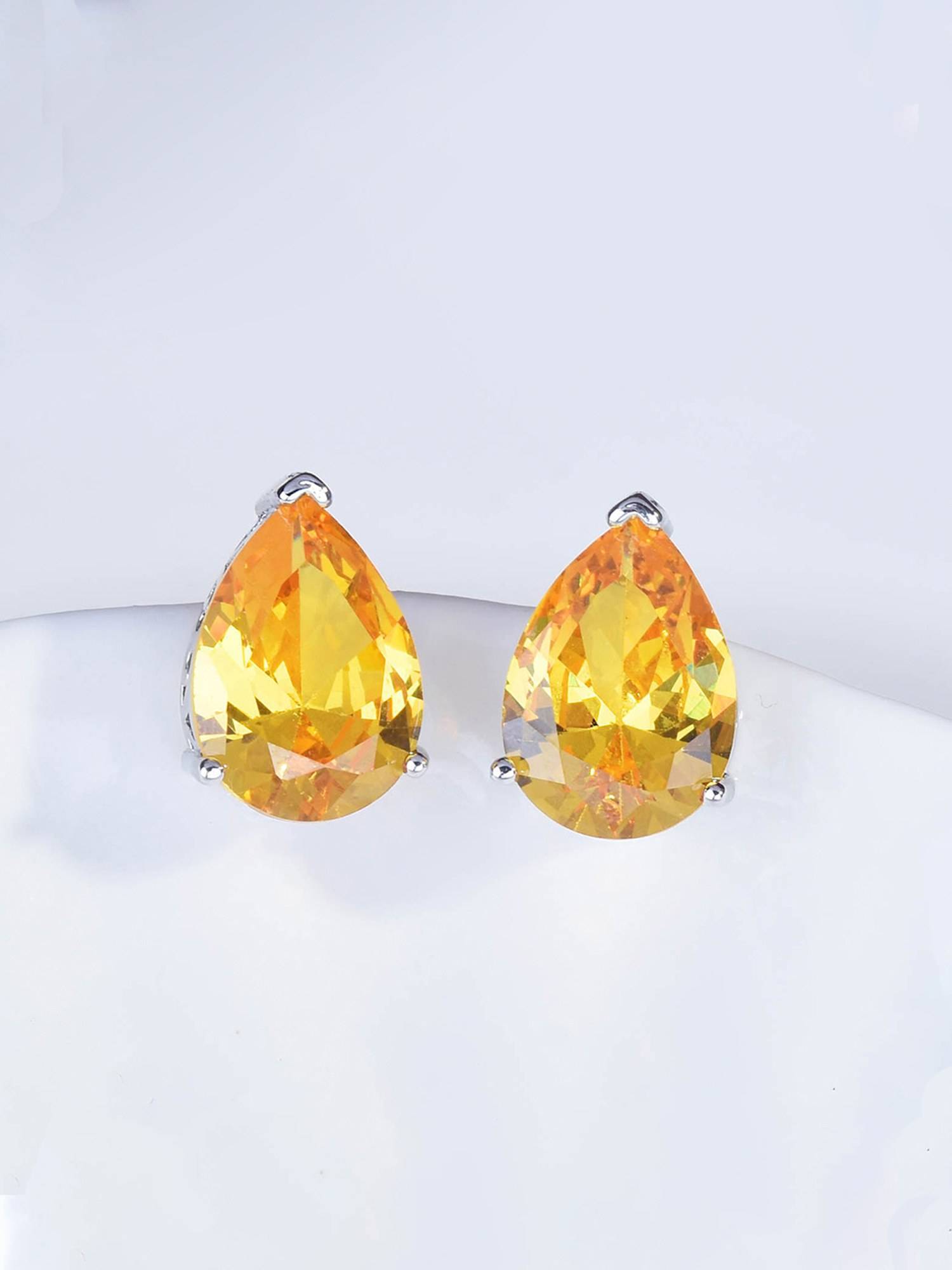 Jewels Galaxy Womens Yellow American Diamond Studded Teardrop Shaped Stud Earrings