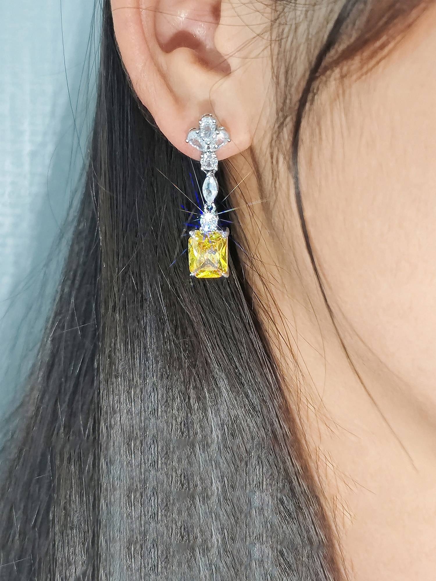 Jewels Galaxy Womens Silver Plated Yellow American Diamond Studded Contemporary Teardrop Earrings