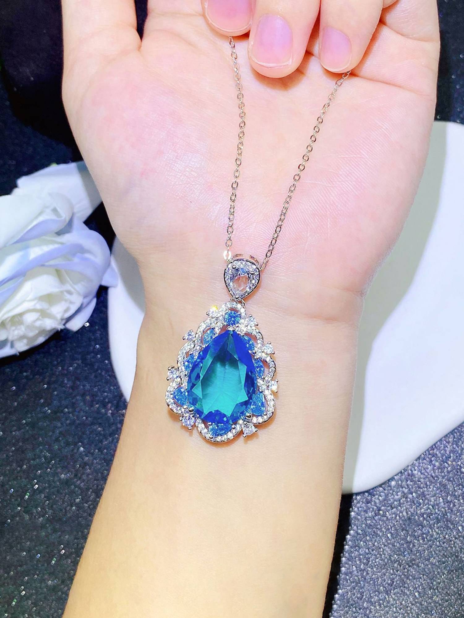 Jewels Galaxy Blue Silver Plated Cubic Zirconia Studded Oval Shaped Necklace