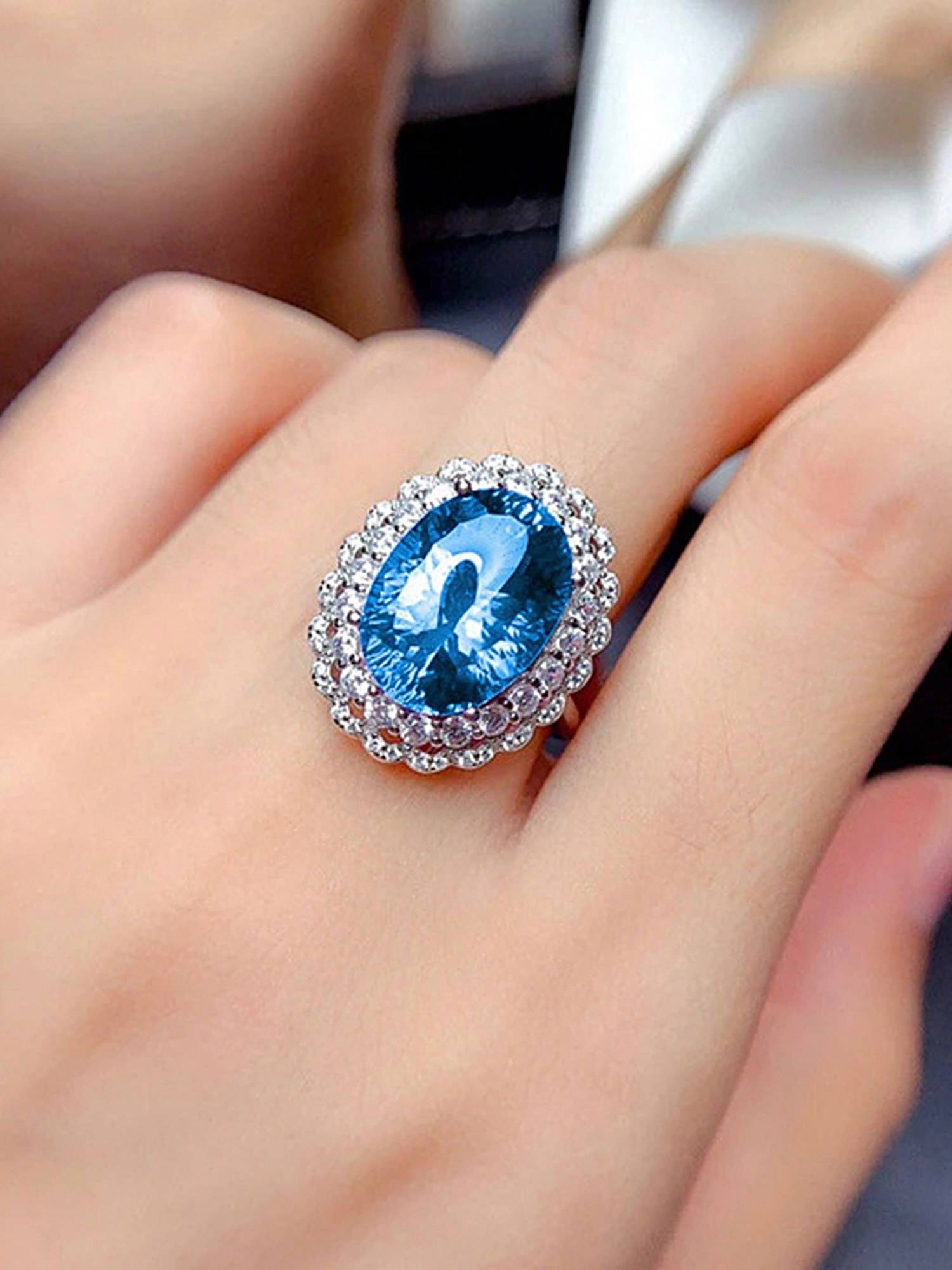 Jewels Galaxy Silver Plated American Diamond Crushed Ice Cut Blue Oval Finger Ring
